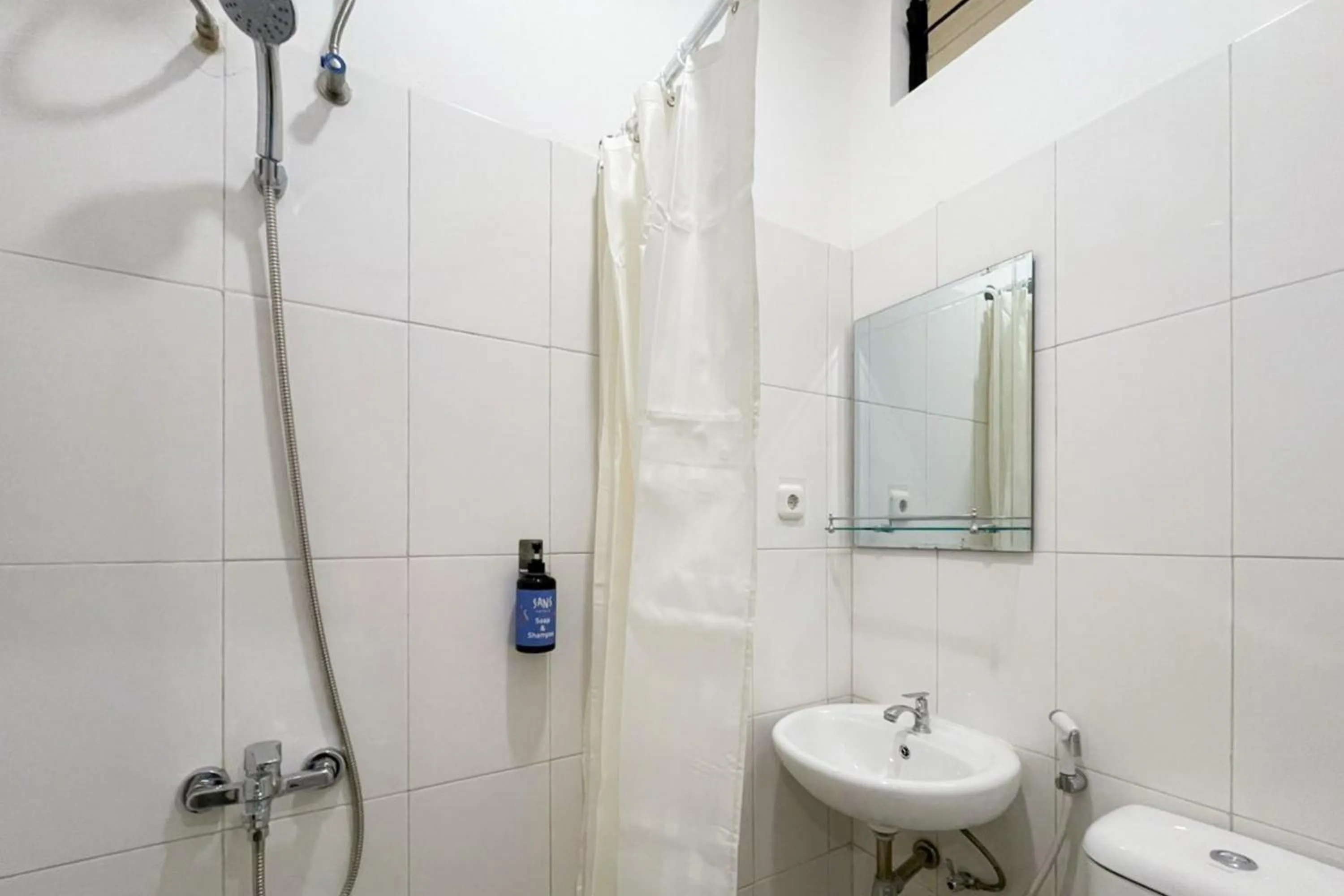 Bathroom in Sans Hotel Cengkareng
