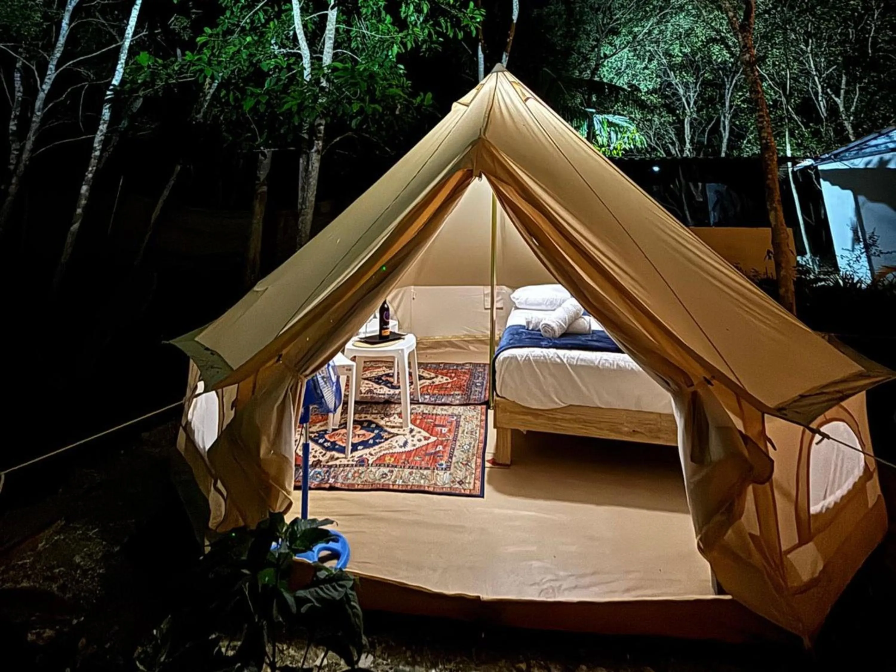 Bed in BACALAR INN Hotel