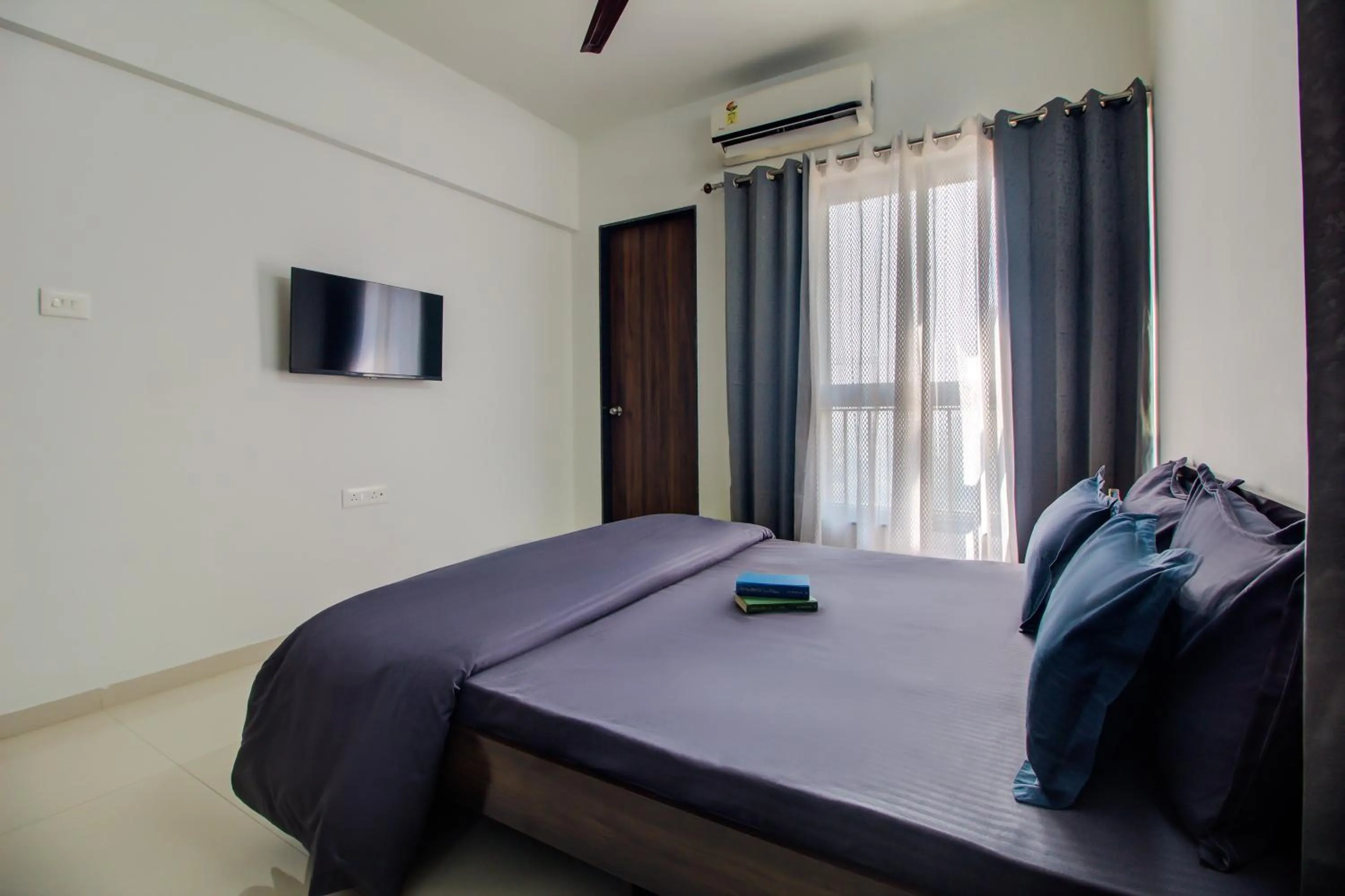 Bed in VibeStayZ Kedar Hinjewadi