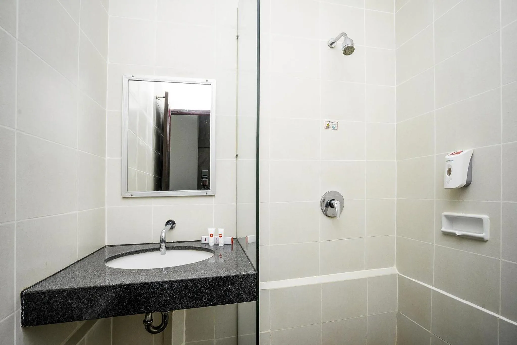 Bathroom in Hotel Grand Kartika