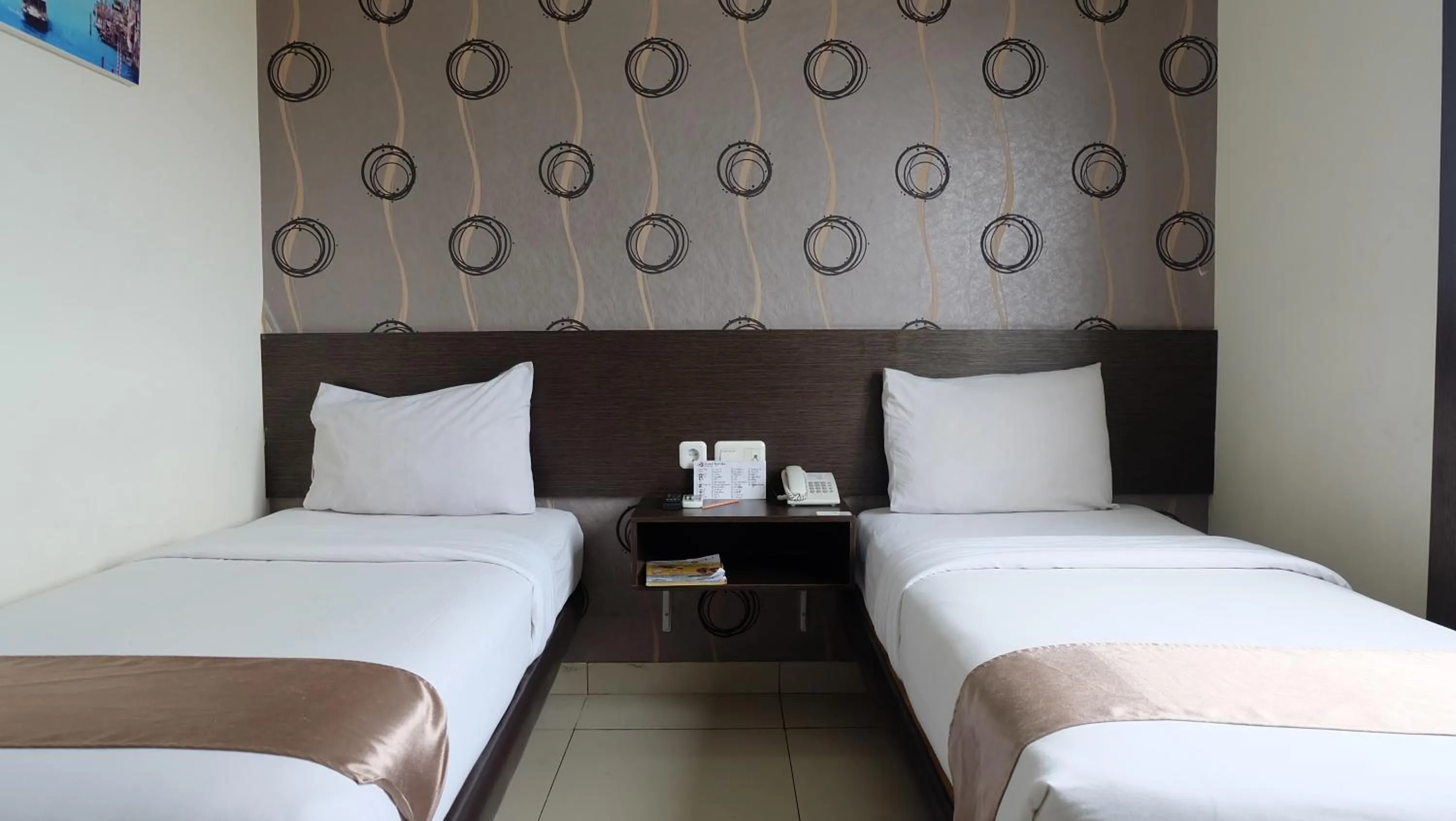 Bedroom in Hotel Grand Kartika