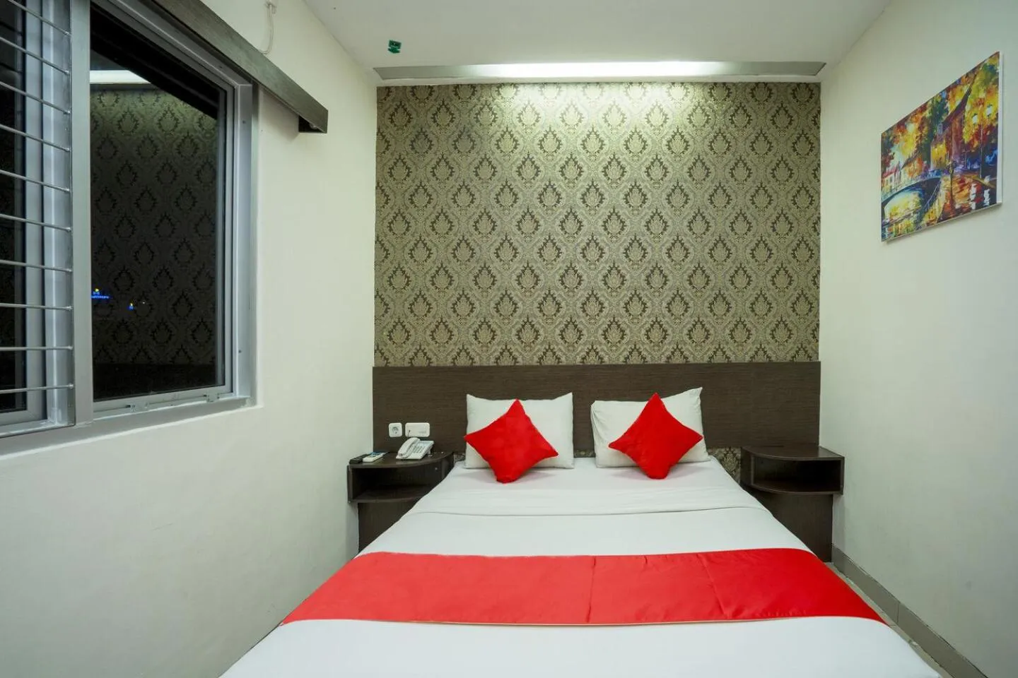 Bedroom in Hotel Grand Kartika