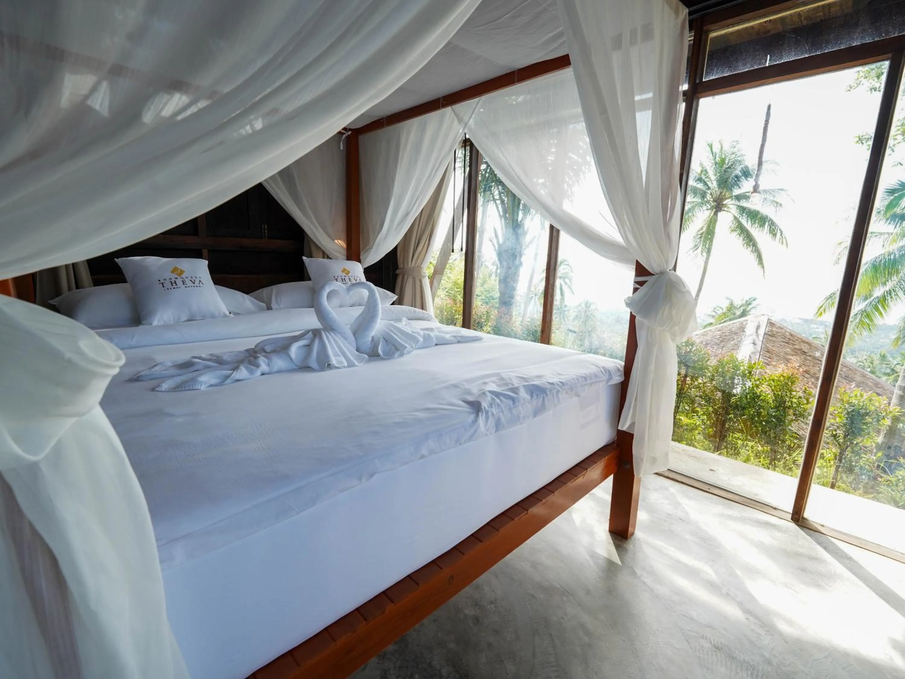 Bed in RoomQuest THEVA Resort Koh Samui