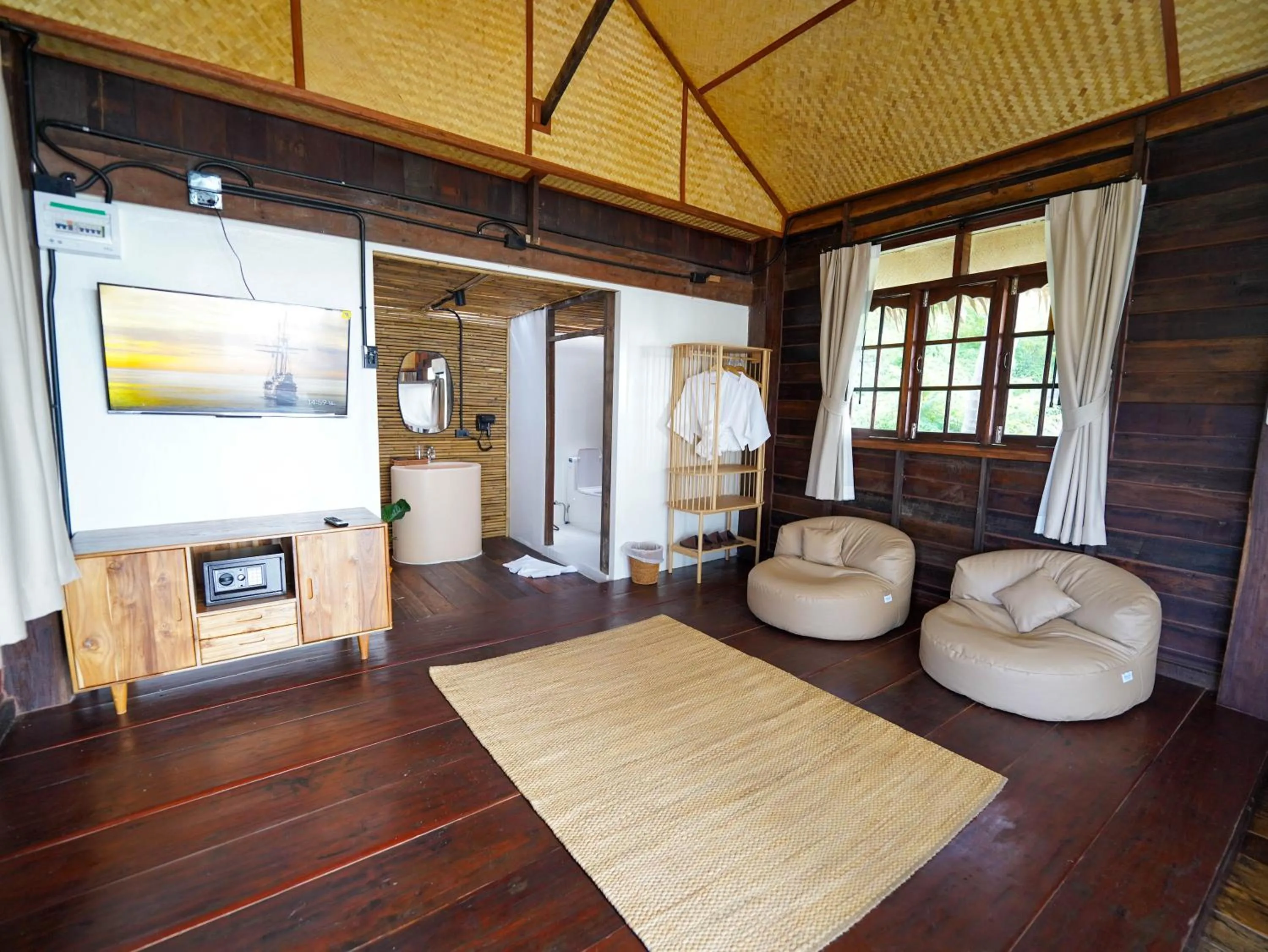 TV and multimedia in RoomQuest THEVA Resort Koh Samui