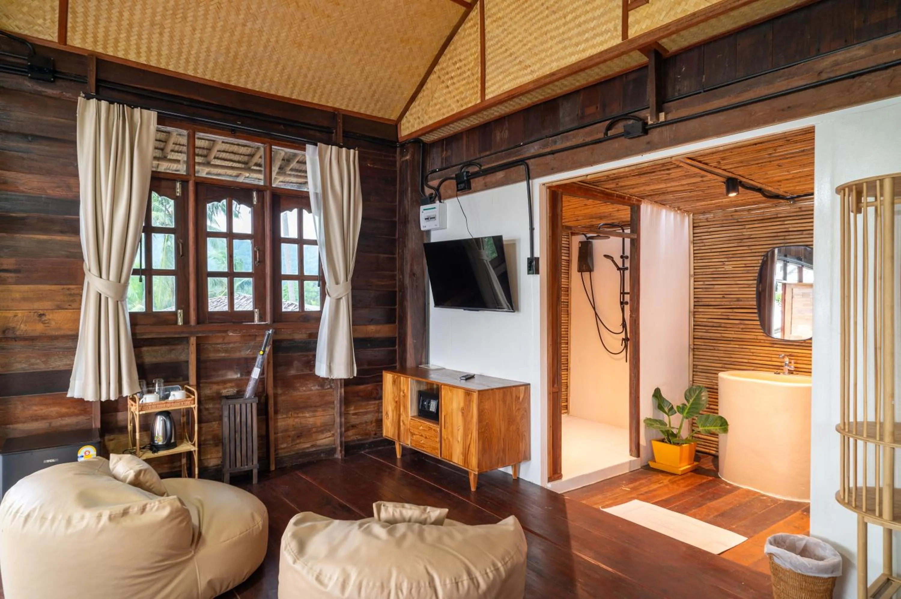 Photo of the whole room in RoomQuest THEVA Resort Koh Samui