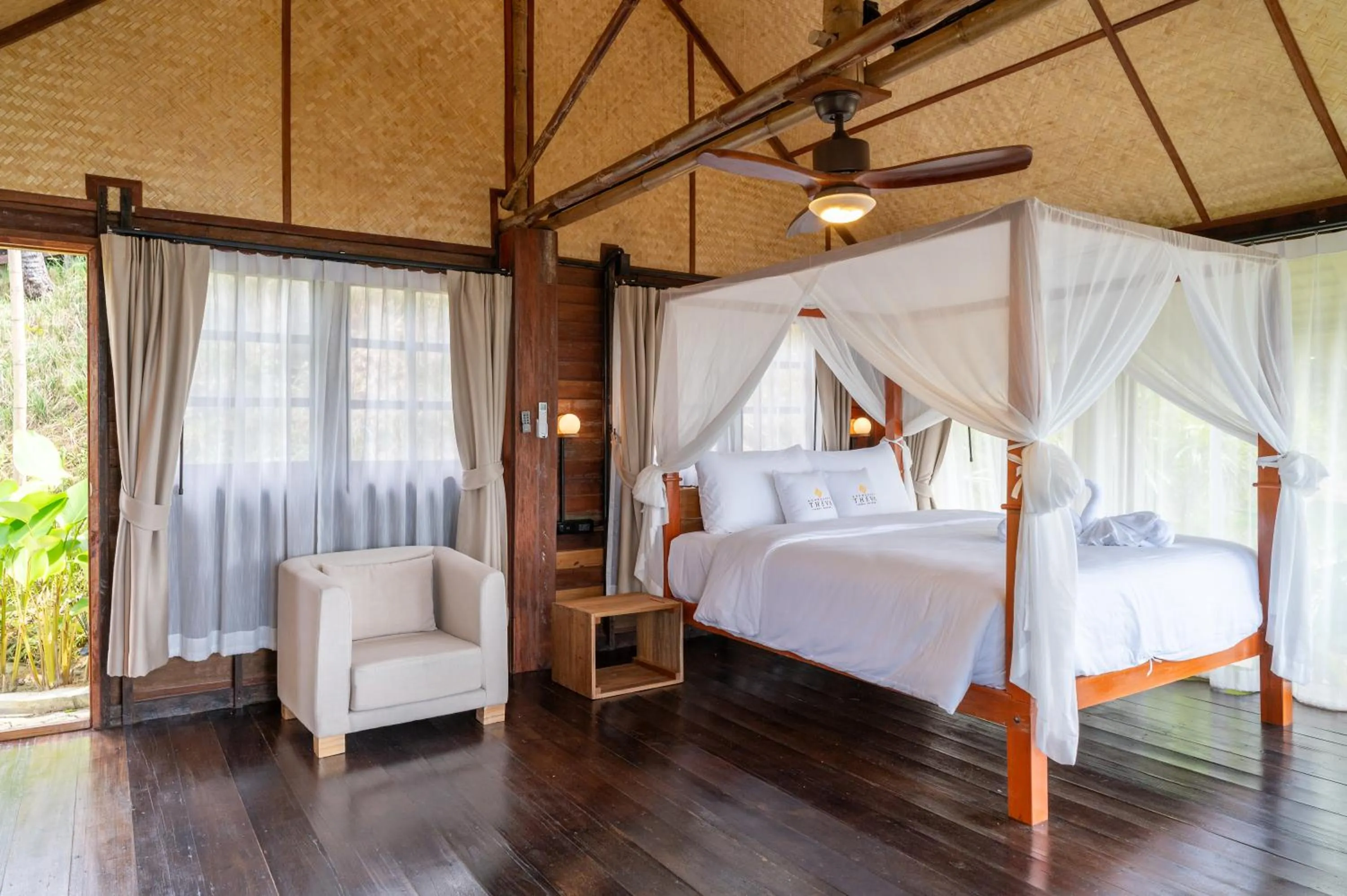 Photo of the whole room, Bed in RoomQuest THEVA Resort Koh Samui