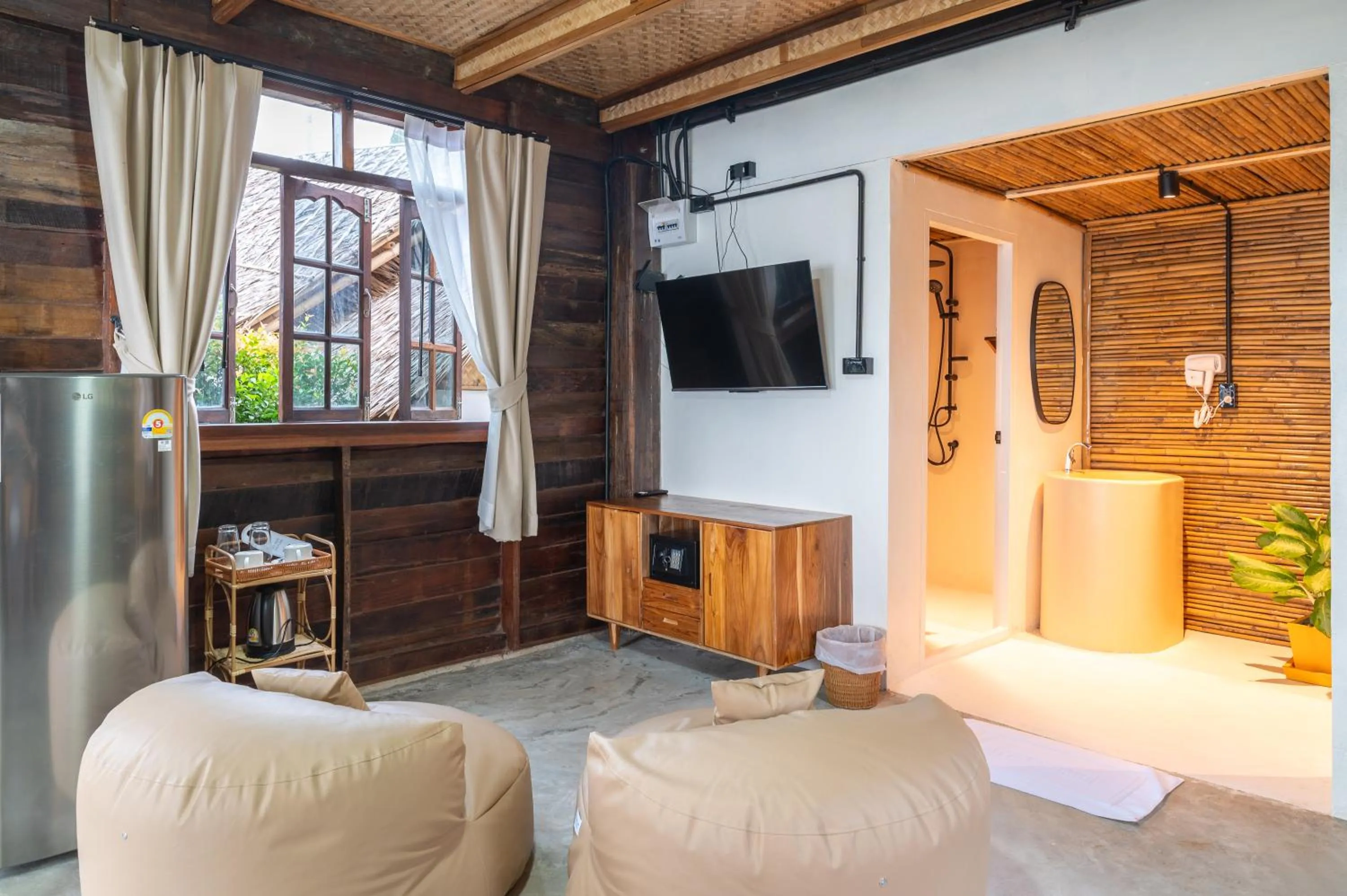 Photo of the whole room in RoomQuest THEVA Resort Koh Samui