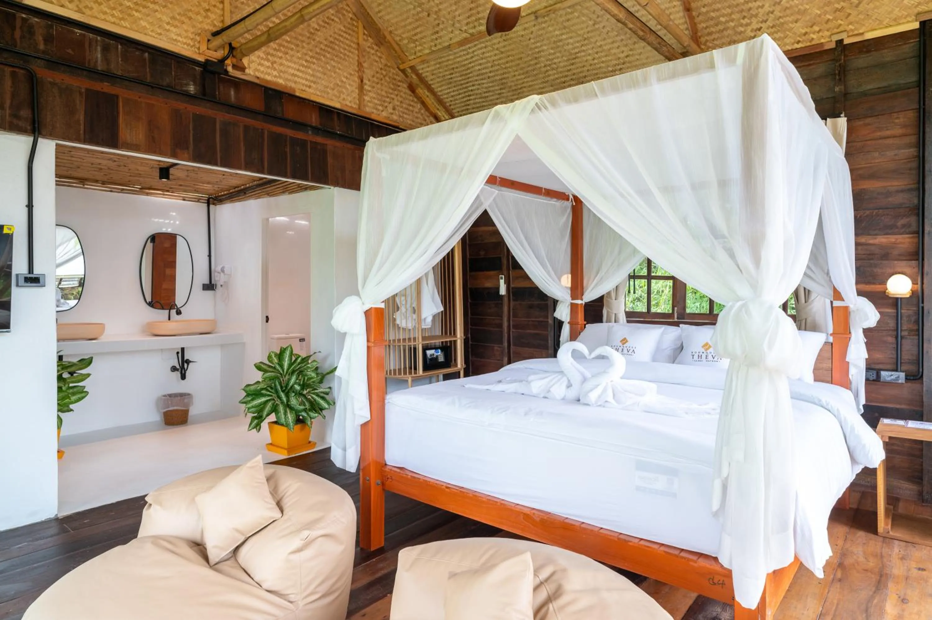 Photo of the whole room, Bed in RoomQuest THEVA Resort Koh Samui