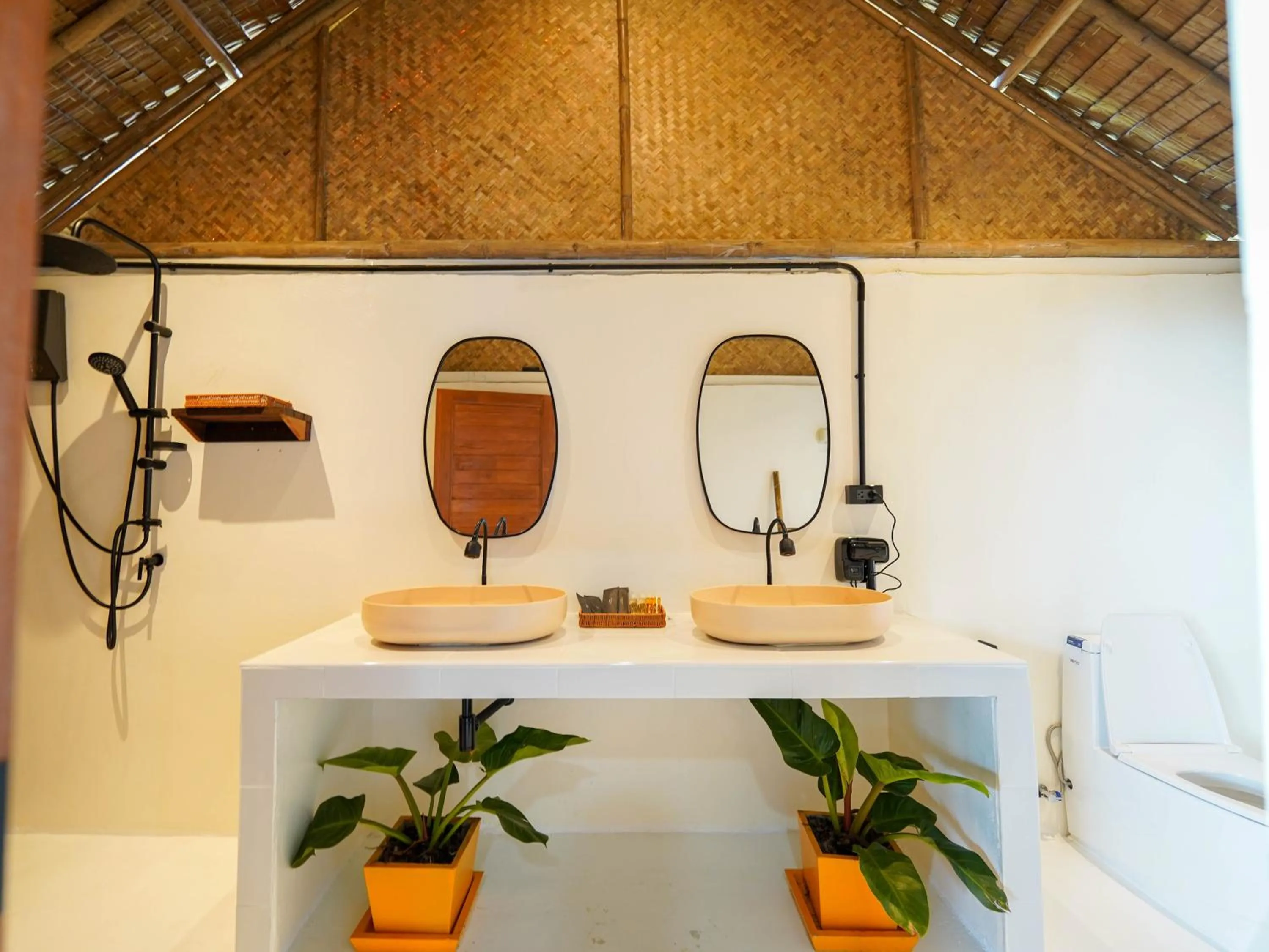 Bathroom in RoomQuest THEVA Resort Koh Samui