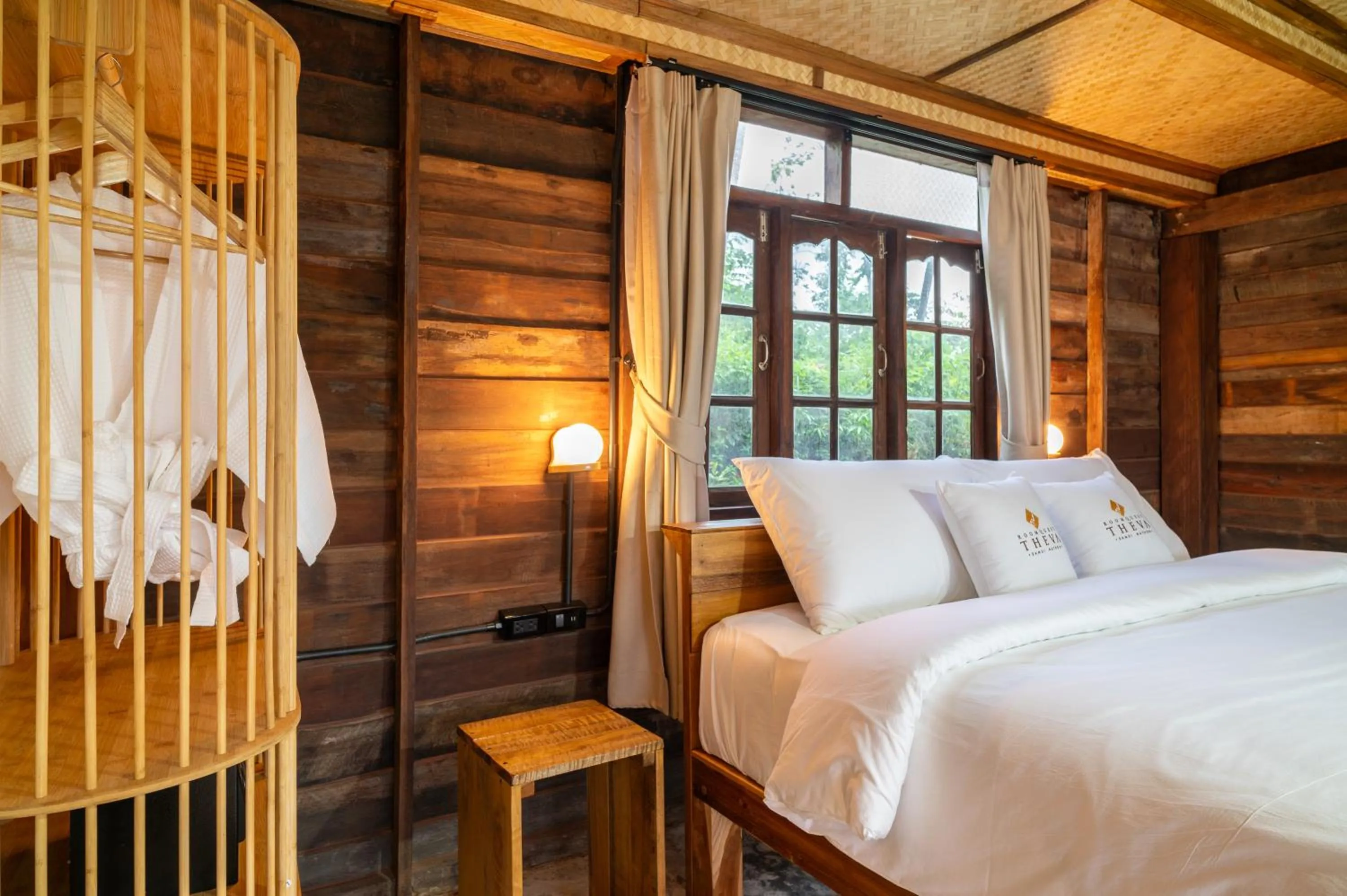 Bed in RoomQuest THEVA Resort Koh Samui