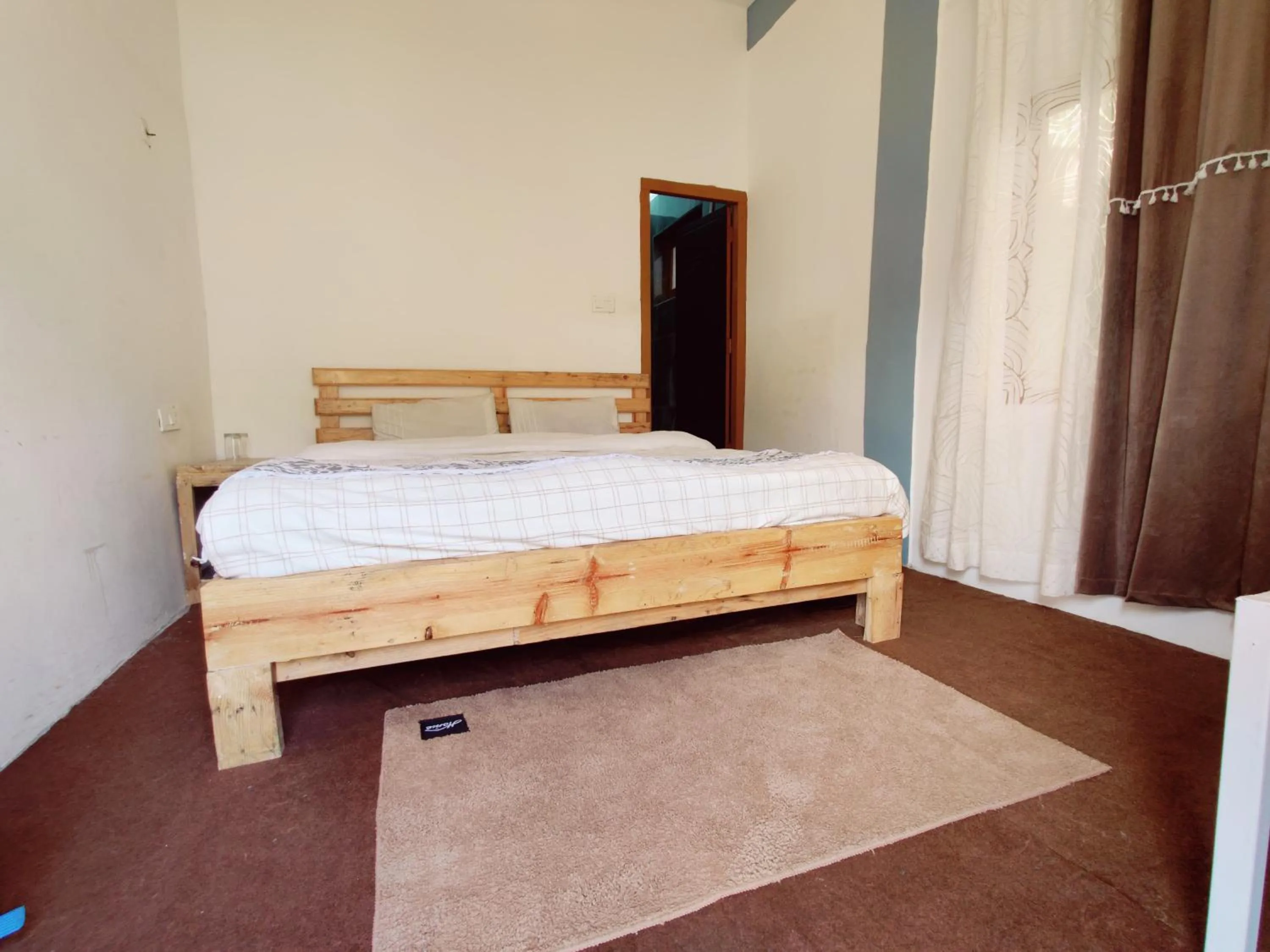 Bed in The Rare Ones, Bhalugaad Resort and game Zone