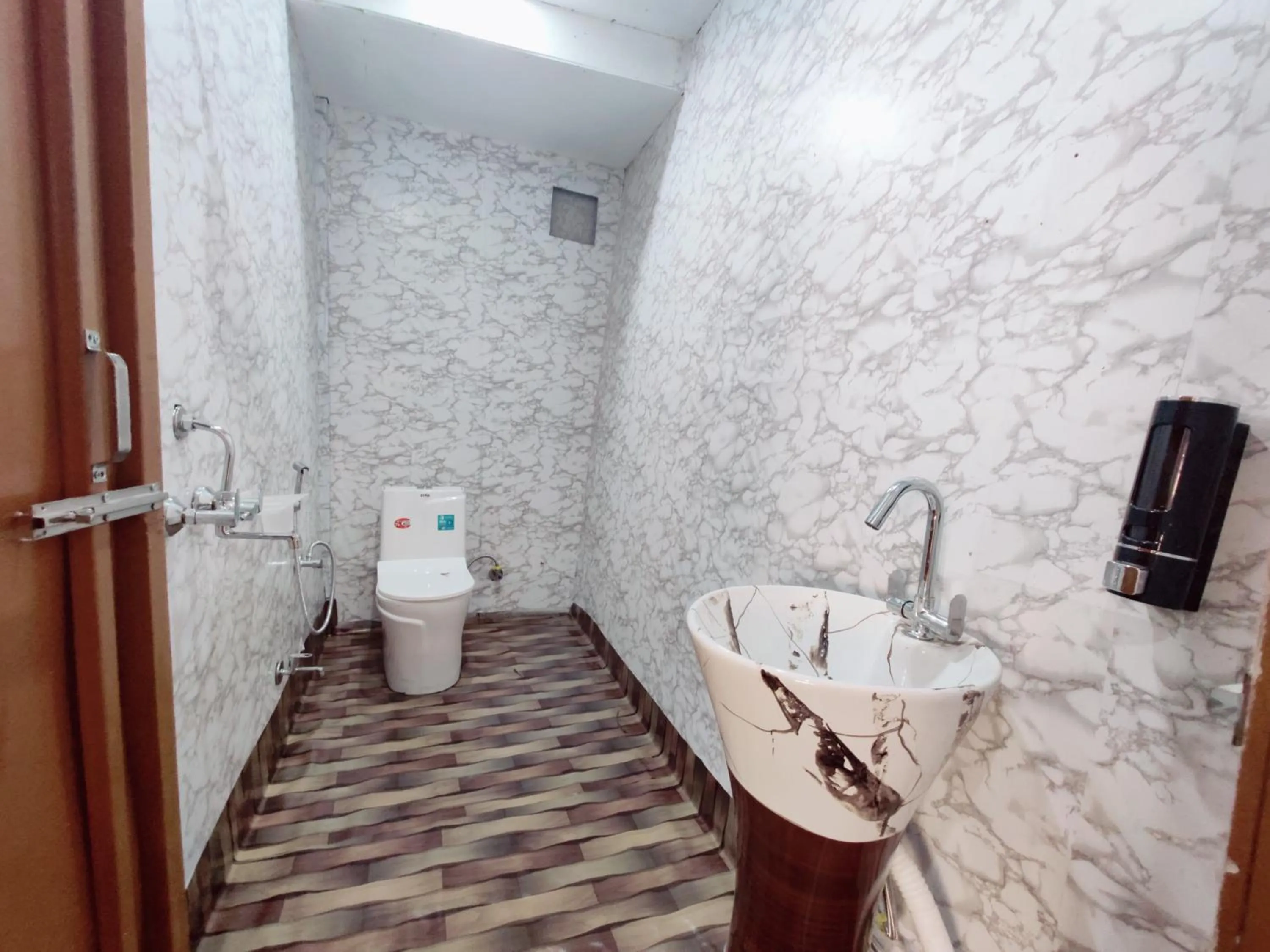 Bathroom in The Rare Ones, Bhalugaad Resort and game Zone