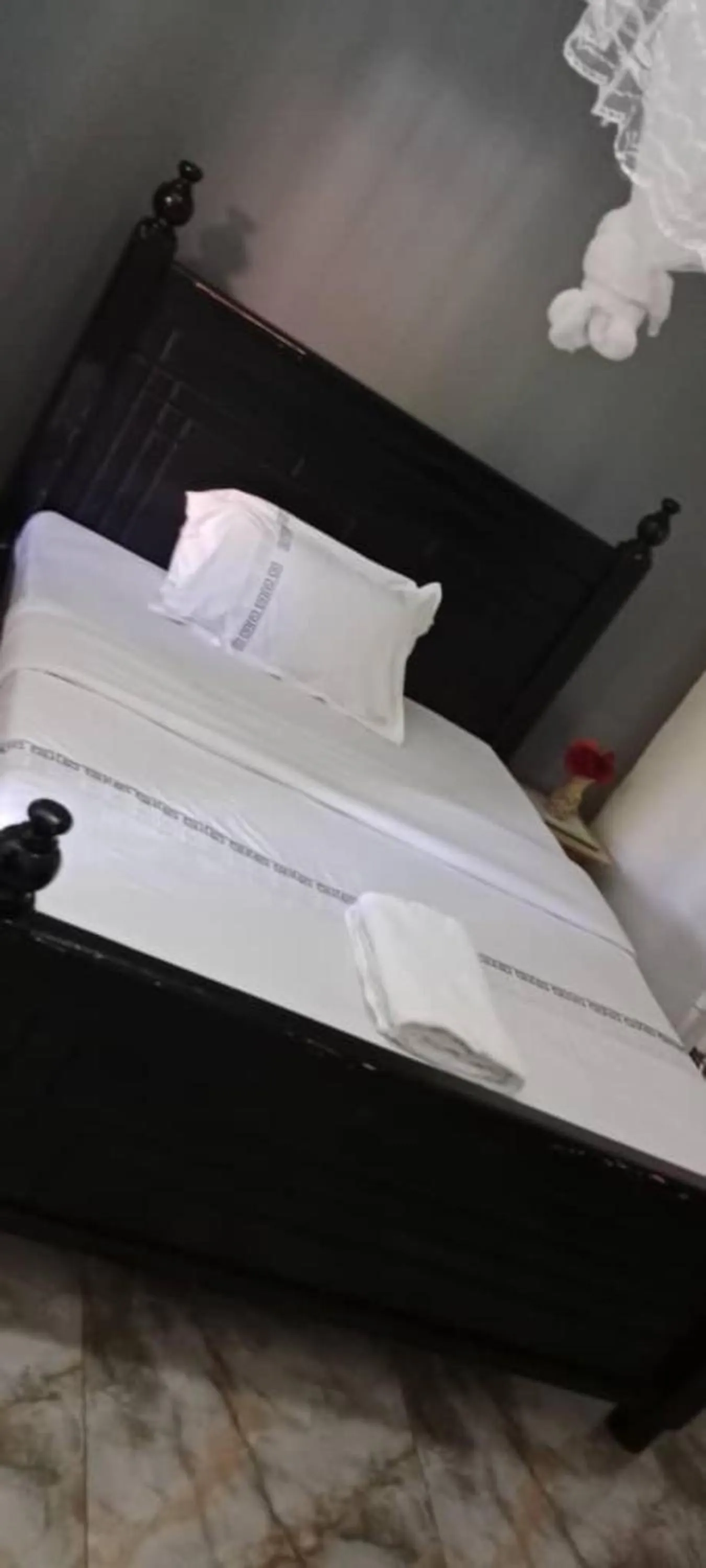 Bed in Gorilla African Guest House