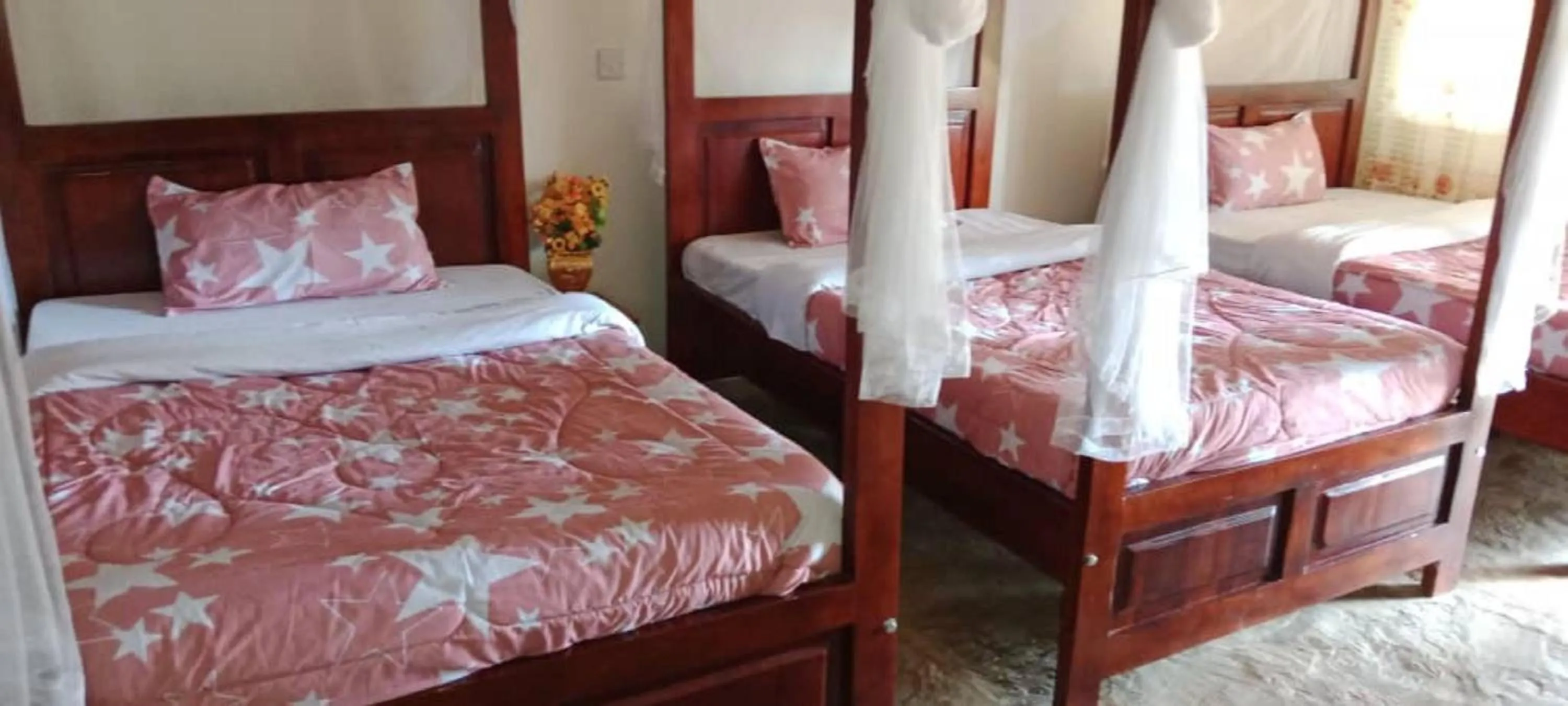 Bed in Gorilla African Guest House