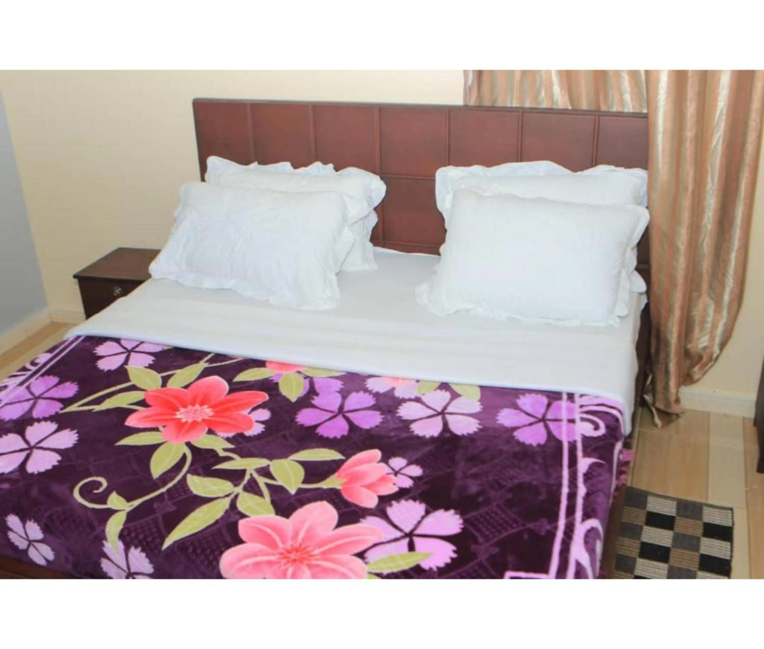 Bed in Gorilla African Guest House