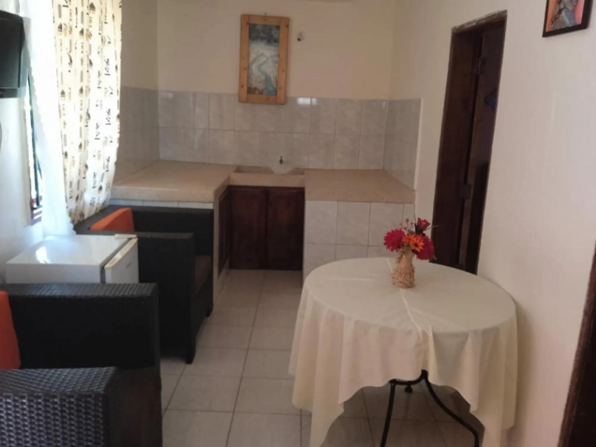 Kitchen or kitchenette in Gorilla African Guest House