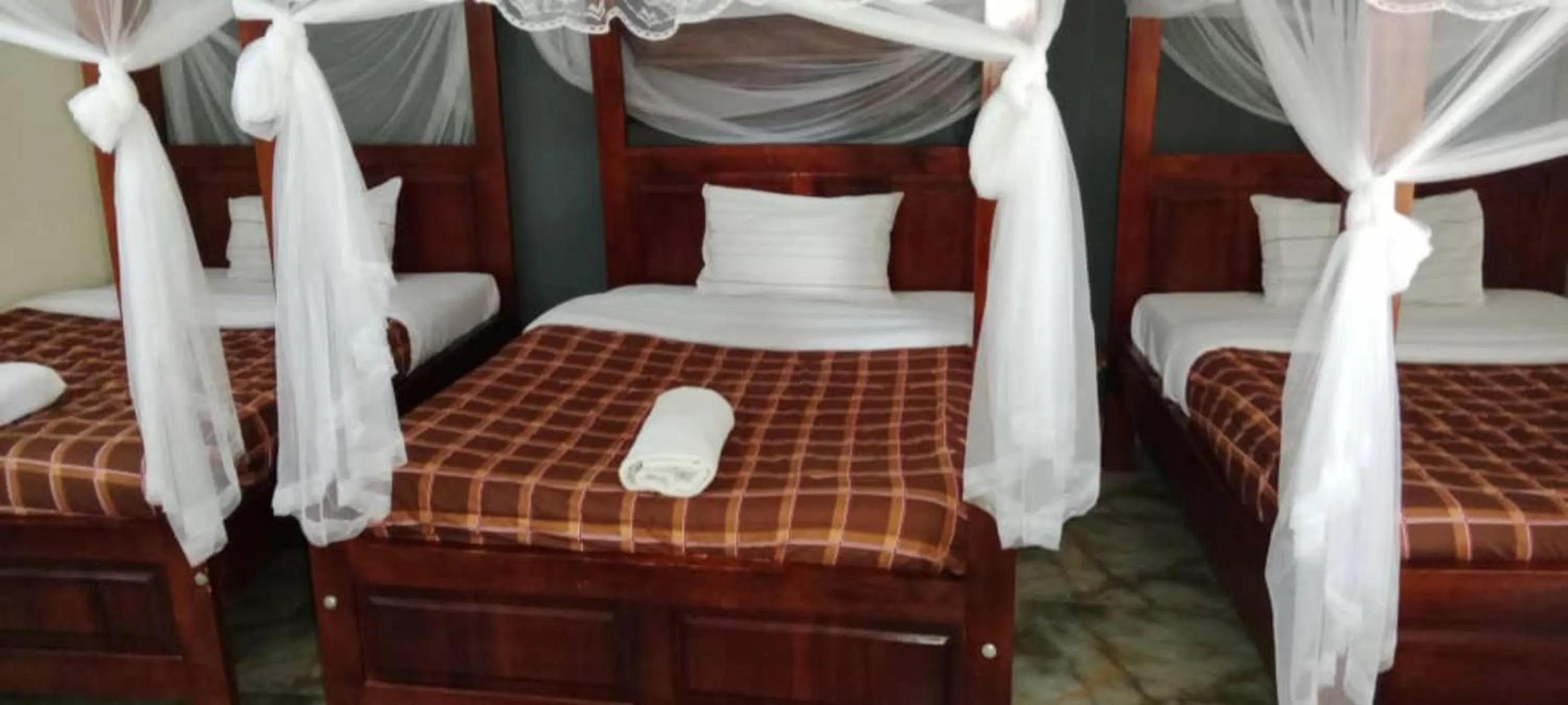 Bed in Gorilla African Guest House