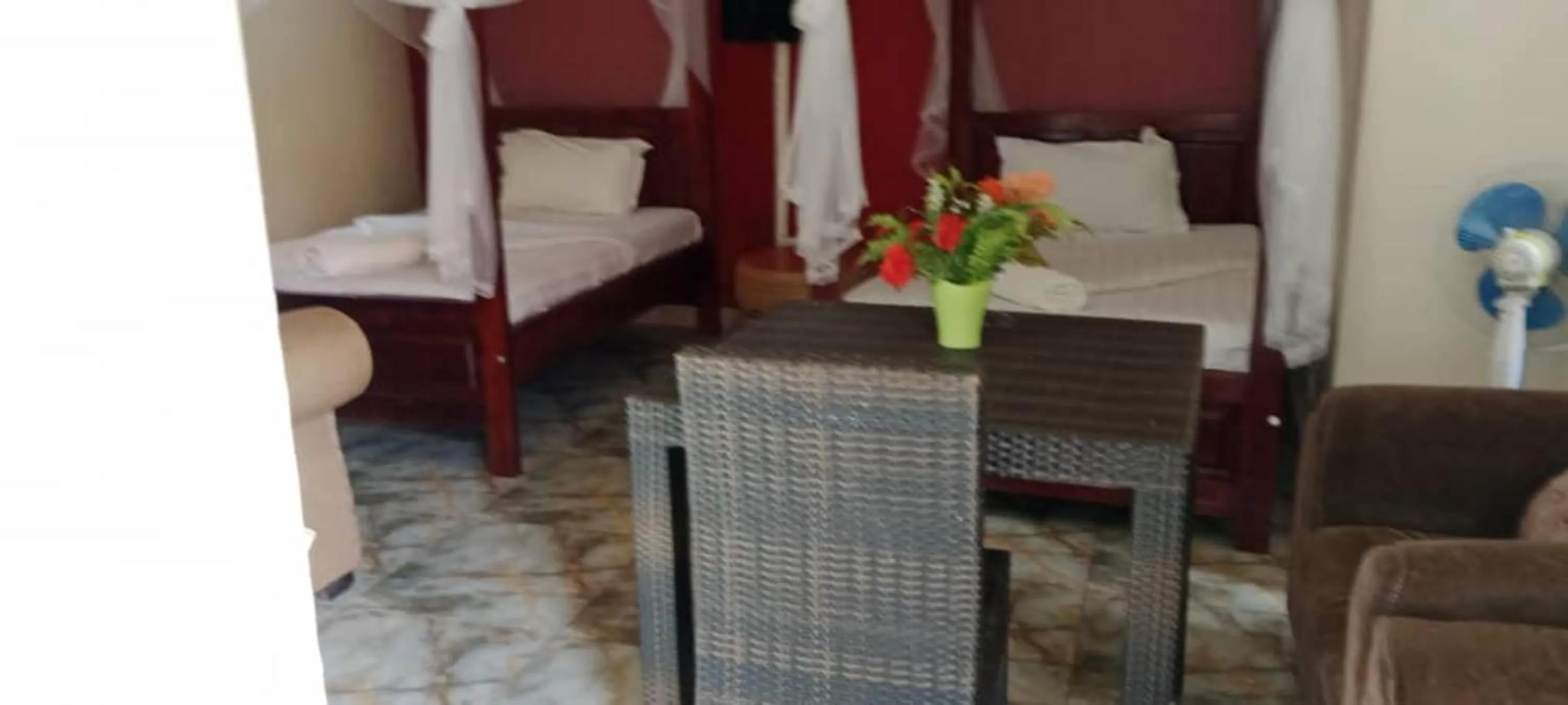 Bed in Gorilla African Guest House