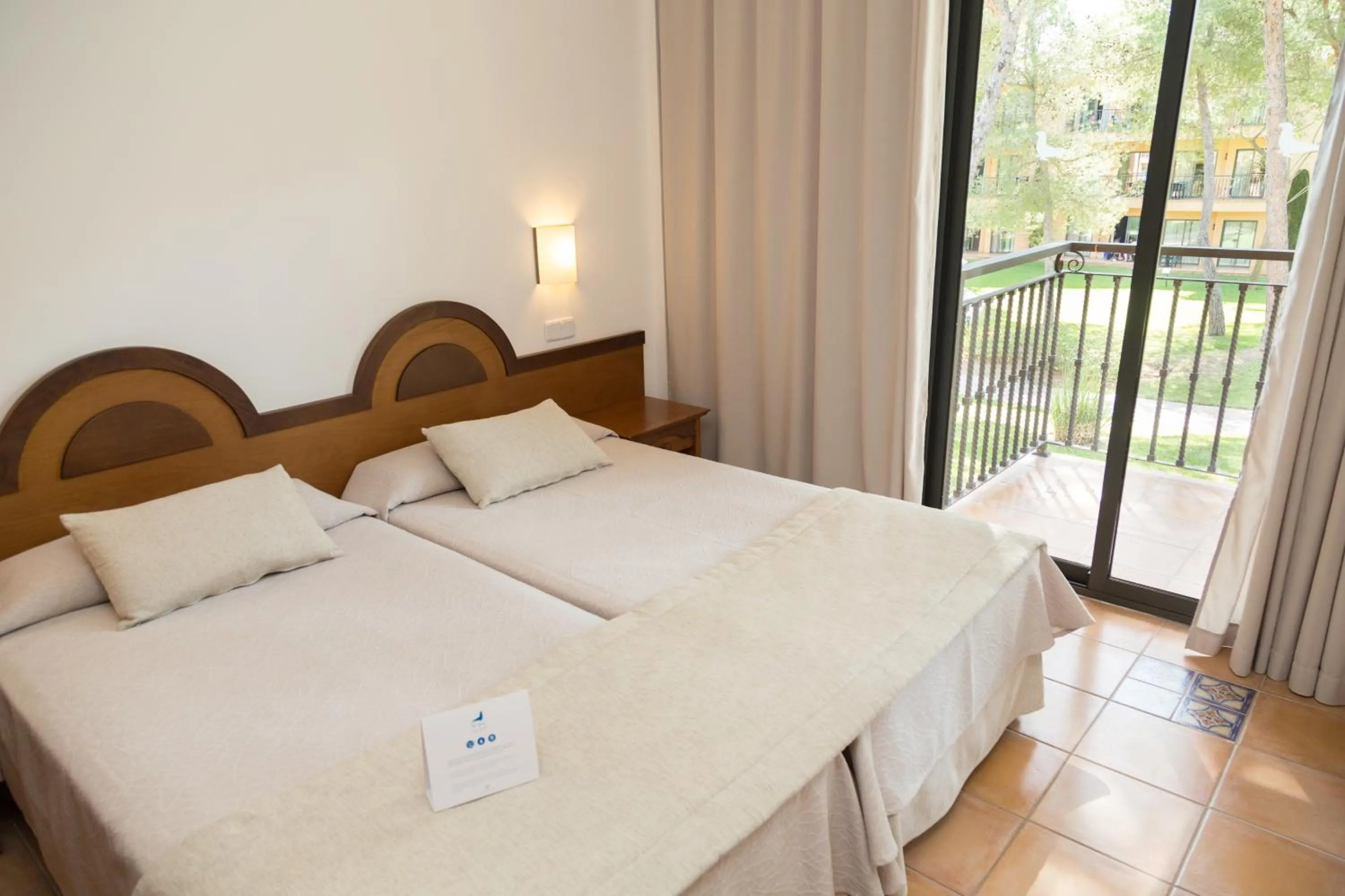 Bed in Vell Mari Hotel & Resort