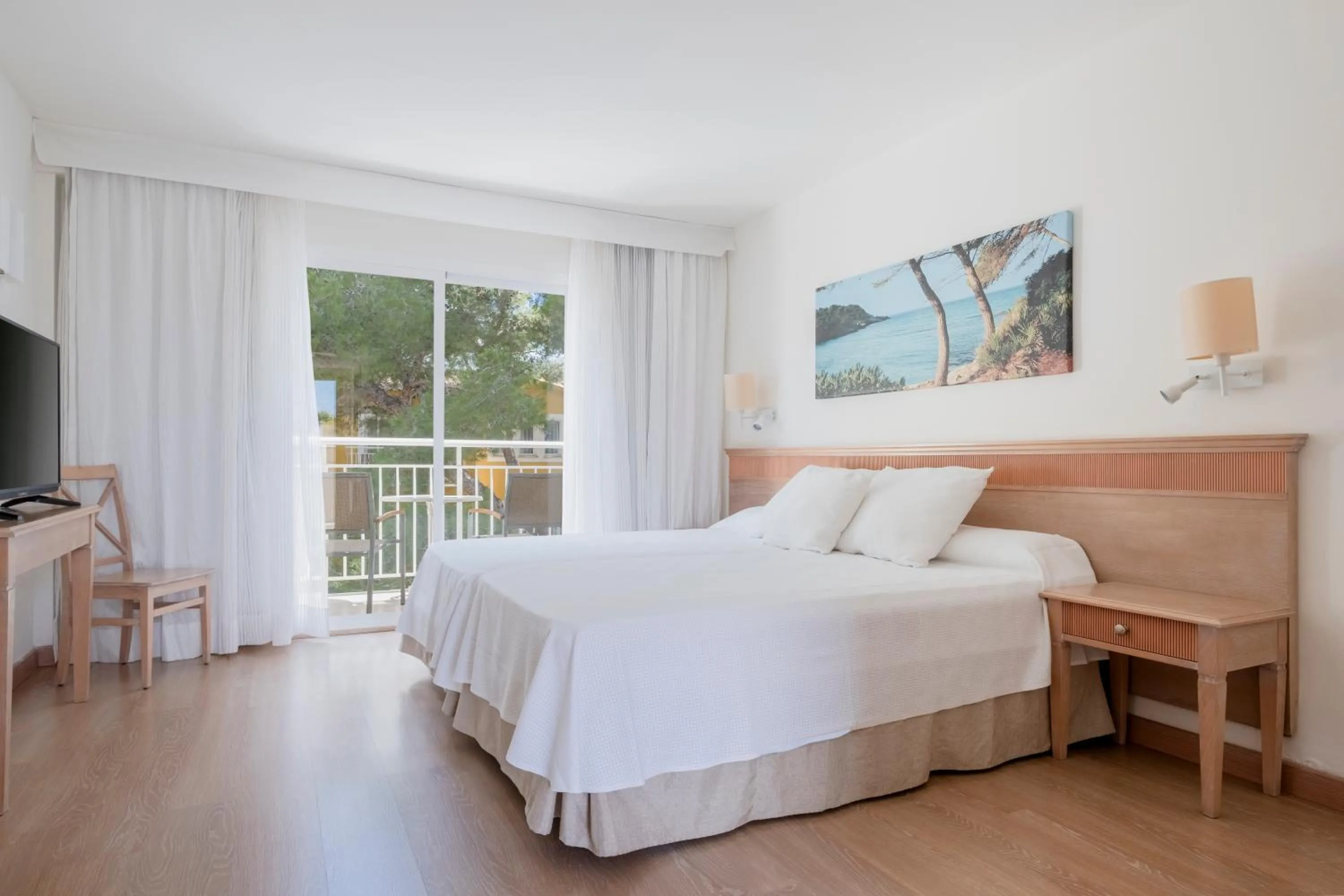 Bedroom in Iberostar Waves Club Cala Barca All Inclusive