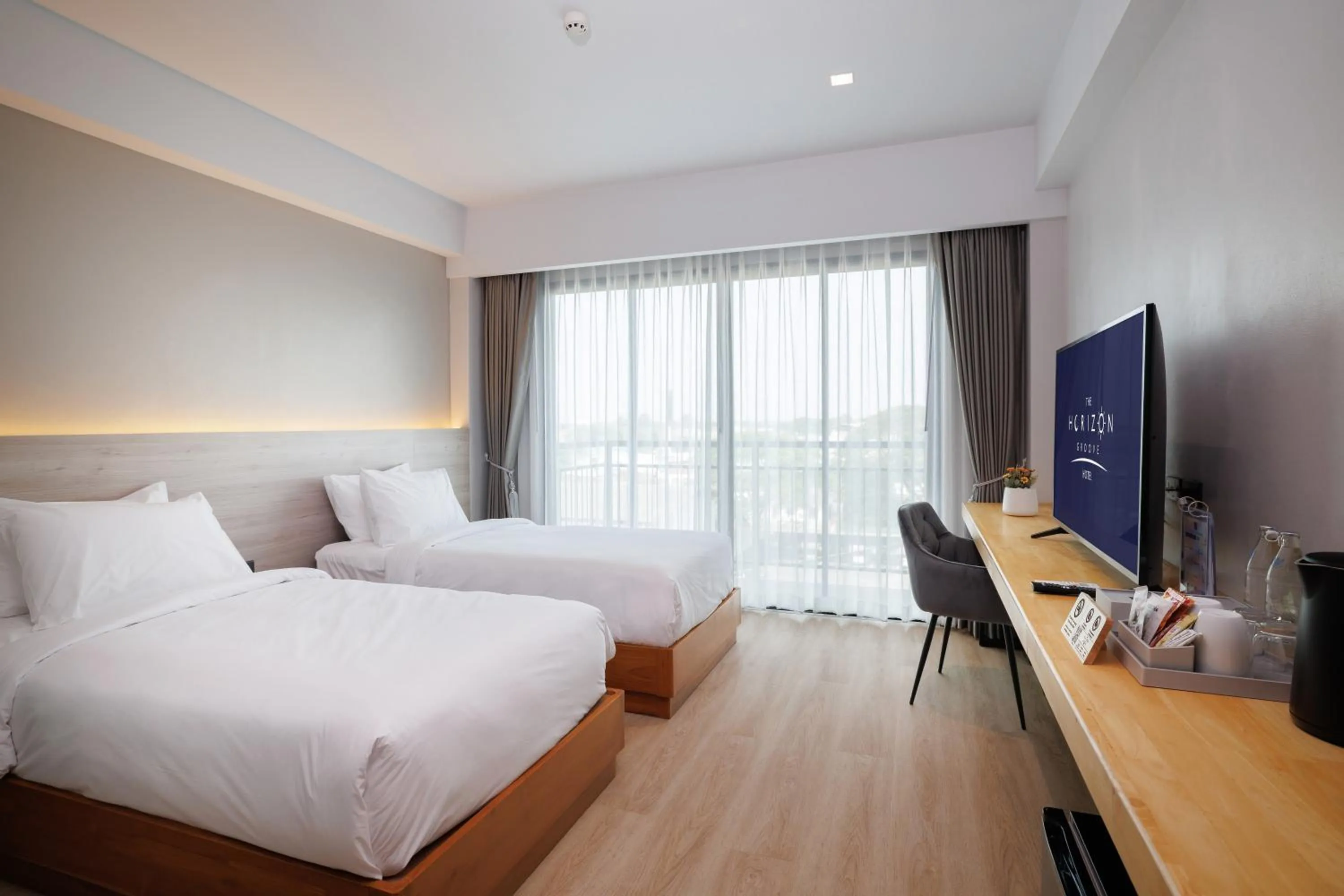 Bed in The Horizon Groove Hotel