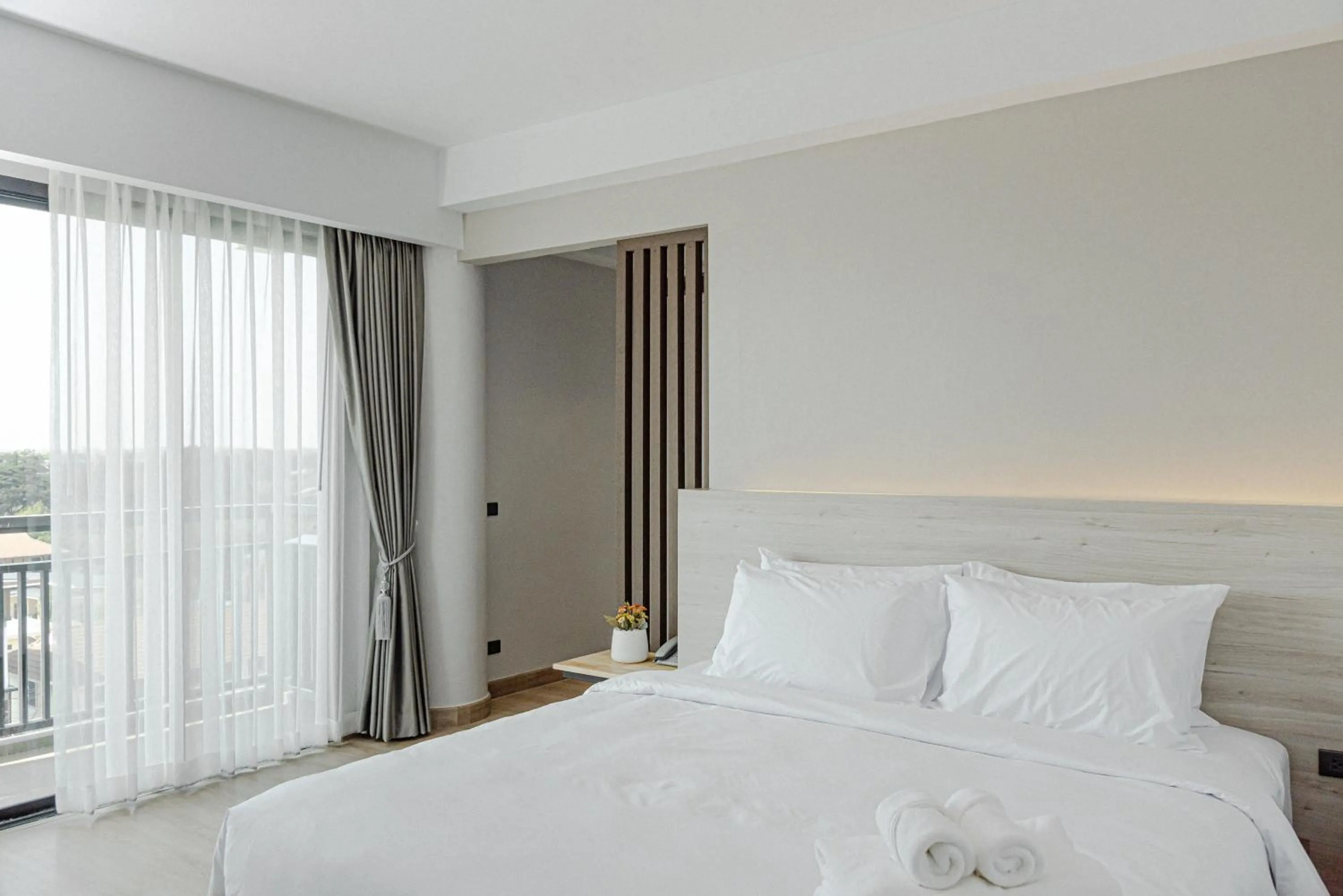 Bed in The Horizon Groove Hotel