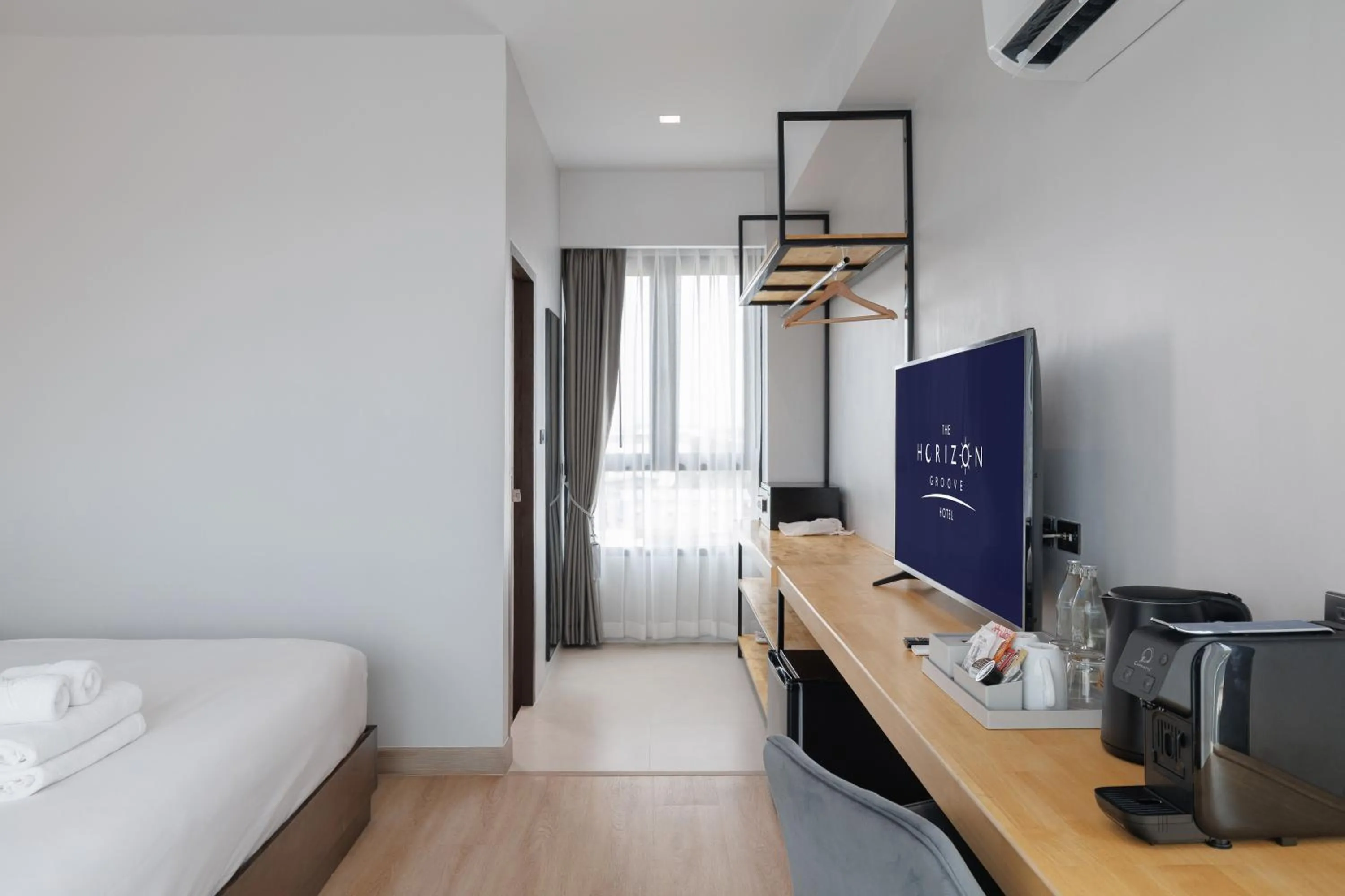 Bed in The Horizon Groove Hotel