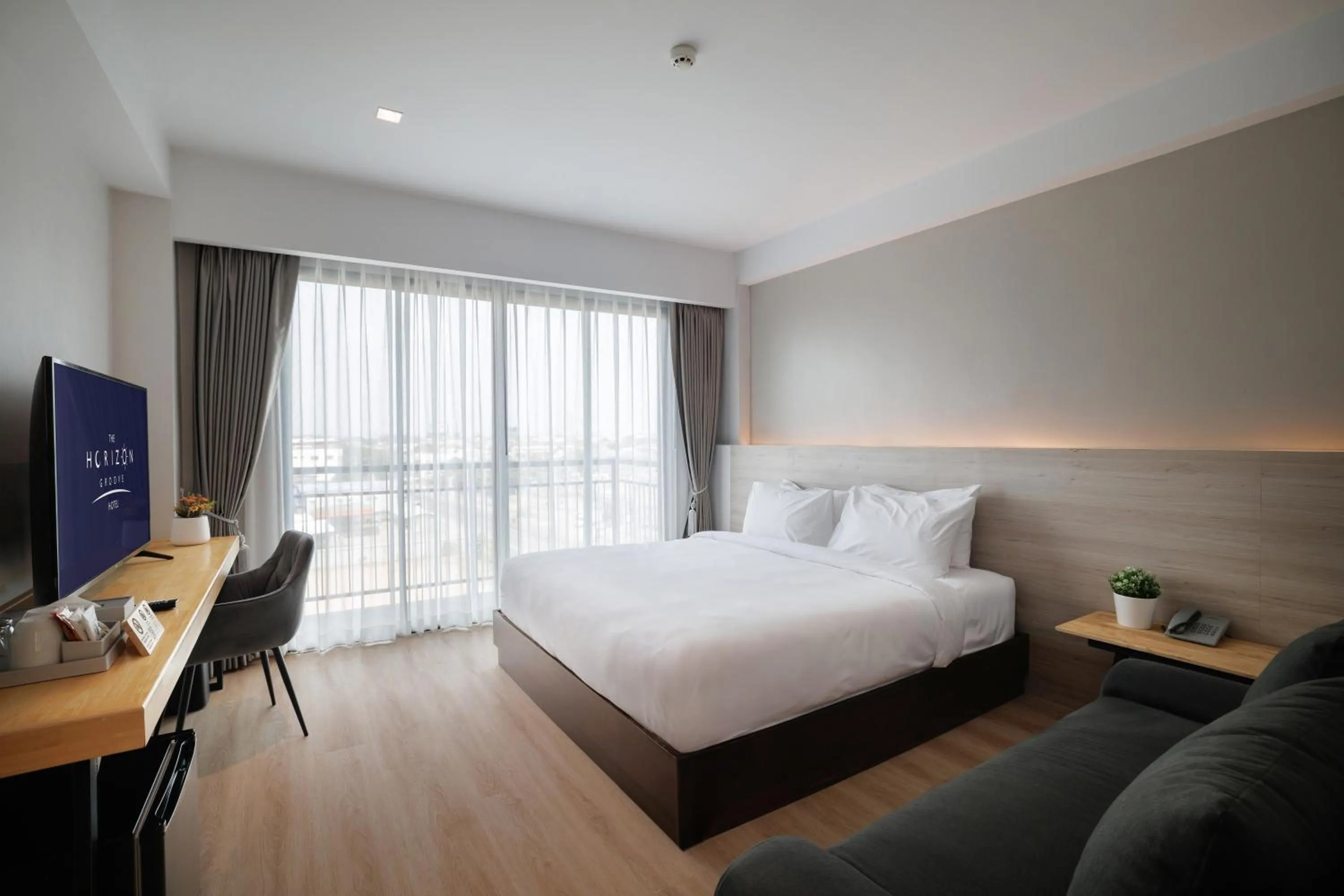 Bed in The Horizon Groove Hotel