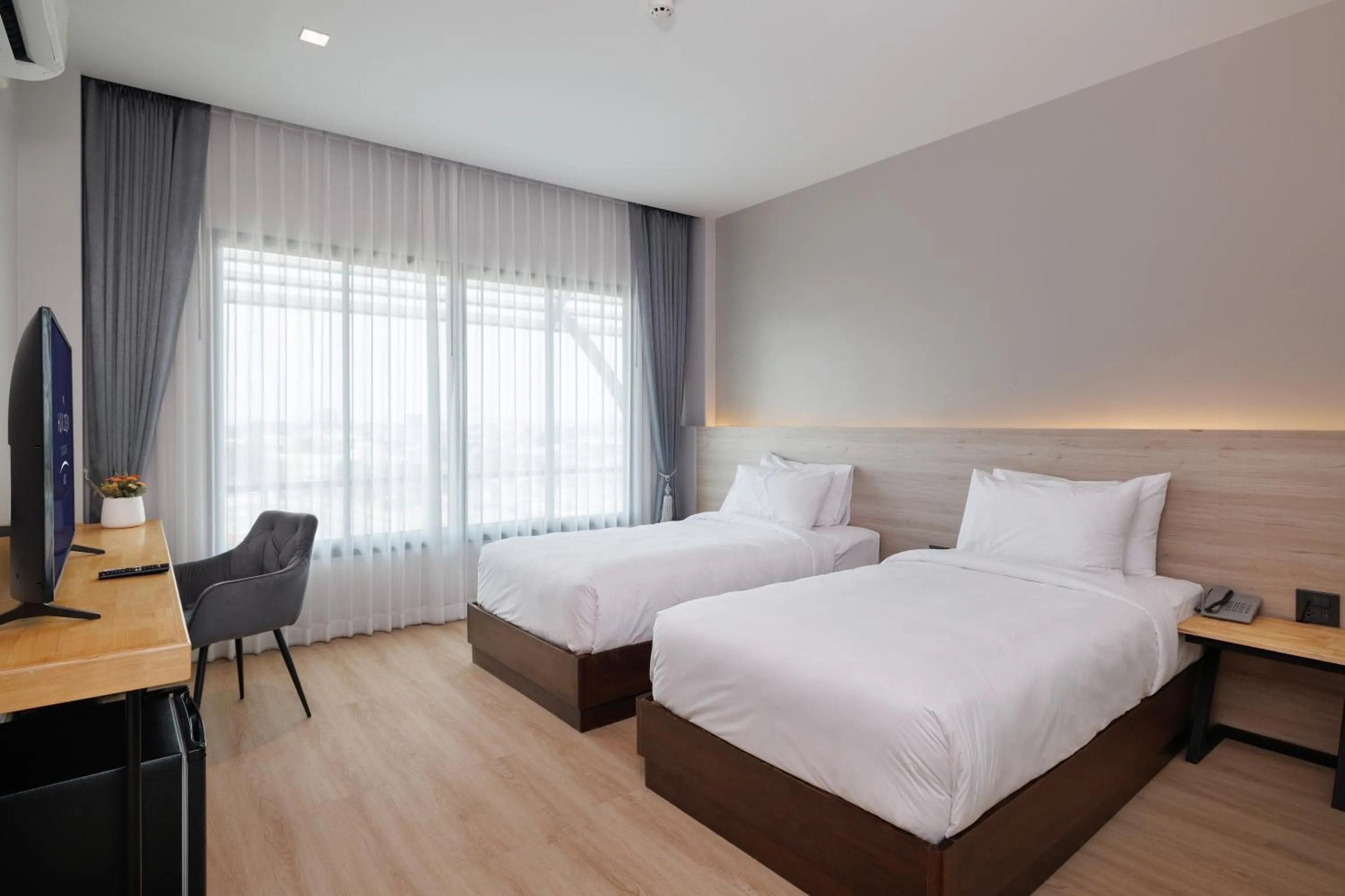 Bed in The Horizon Groove Hotel