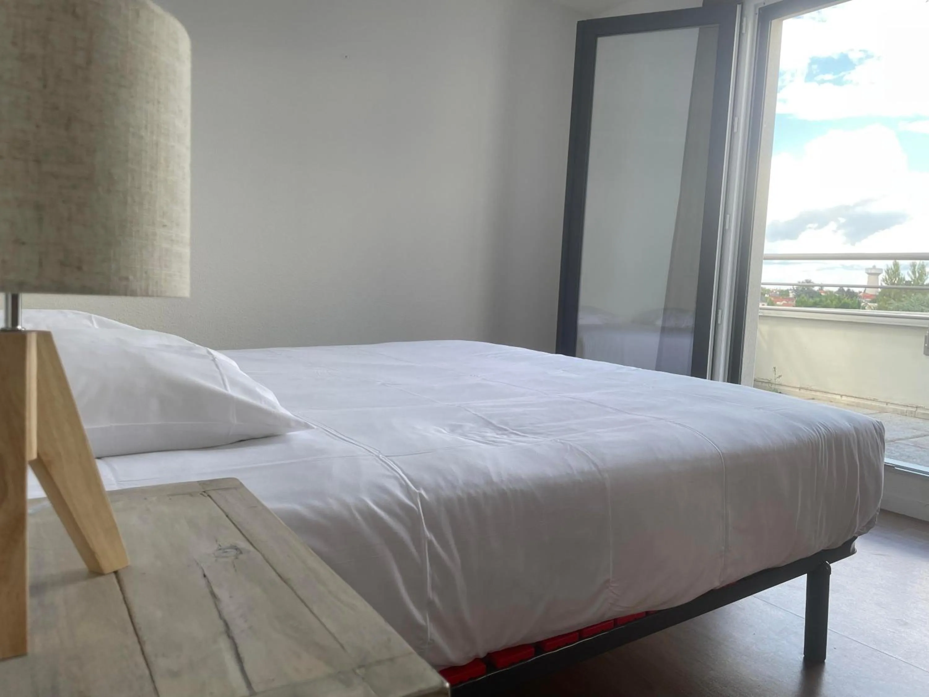 Bed in Zenao Appart'Hotel