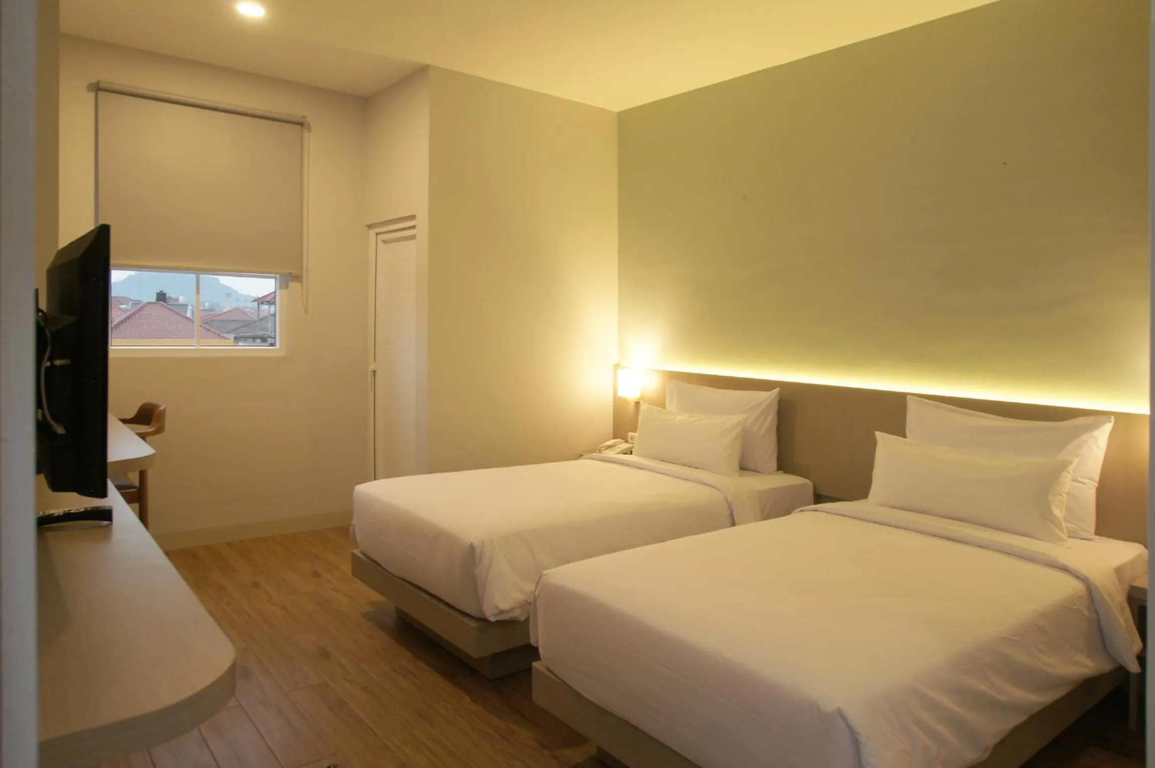 Bed in Hexton Hotel Lampung by Amazing