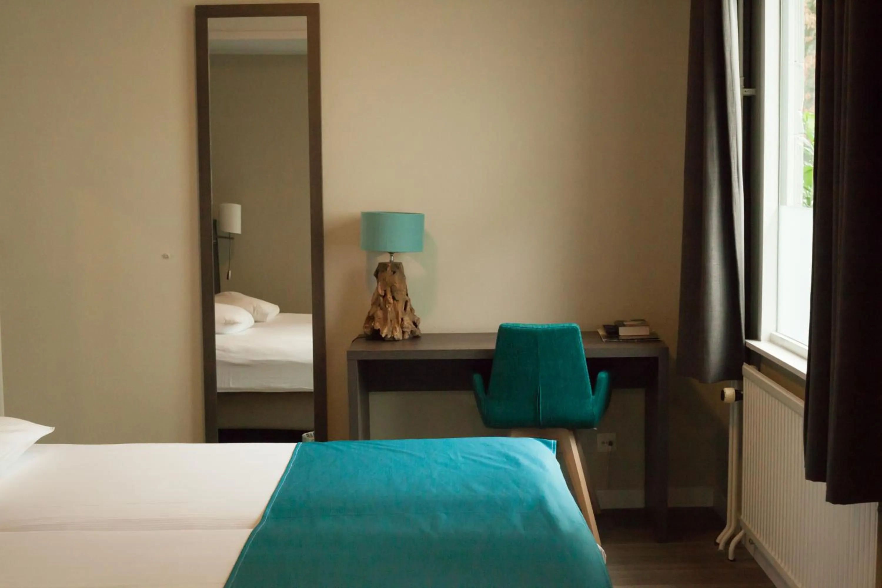 Bed in Hotel de Hoeve van Nunspeet