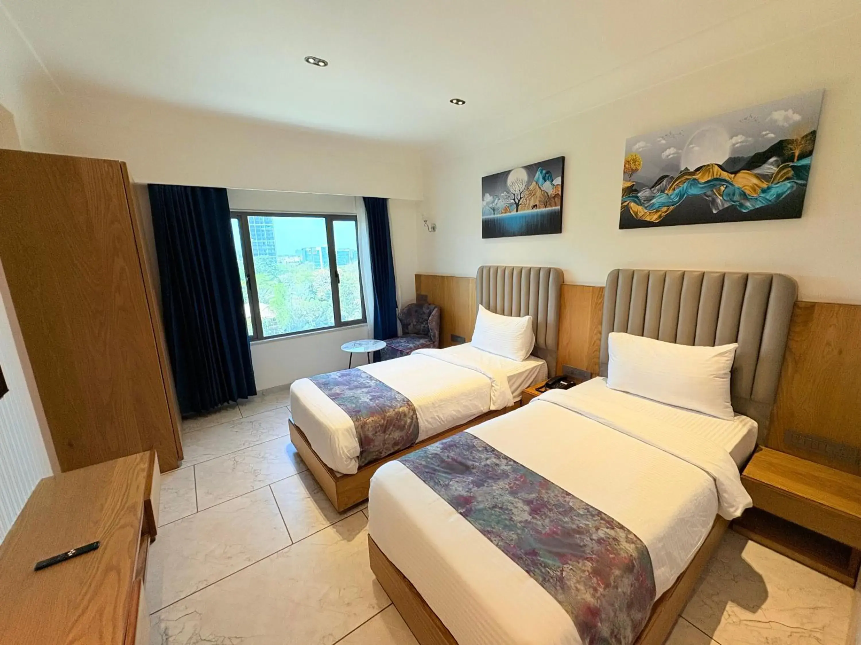 Standard Twin Room - single occupancy in The Parterre - SG Highway Ahmedabad Standard Twin Room - single occupancy in The Parterre - SG Highway Ahmedabad