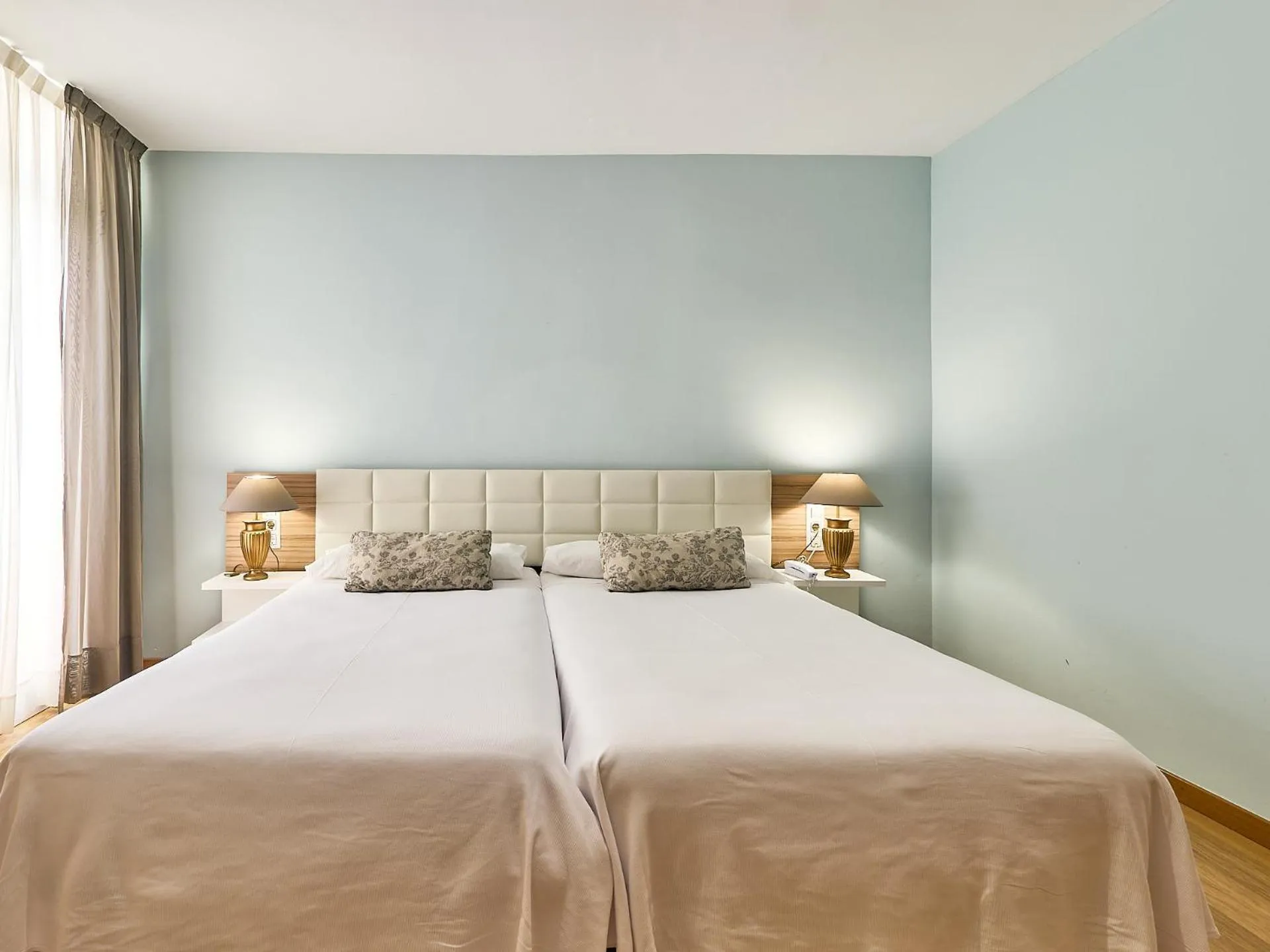 Bed in Mònica Hotel