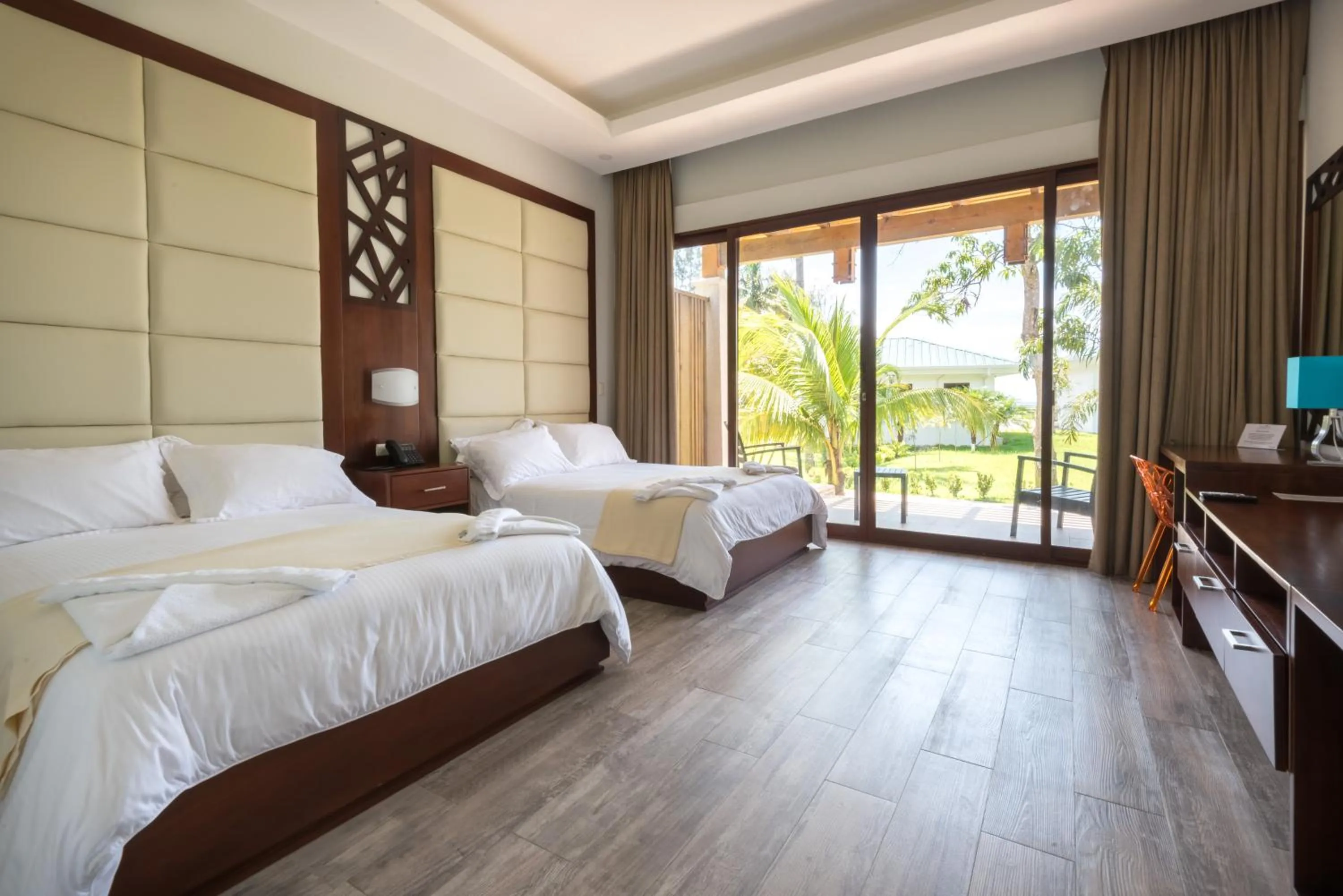 Bed in Paraiso Rainforest and Beach Hotel