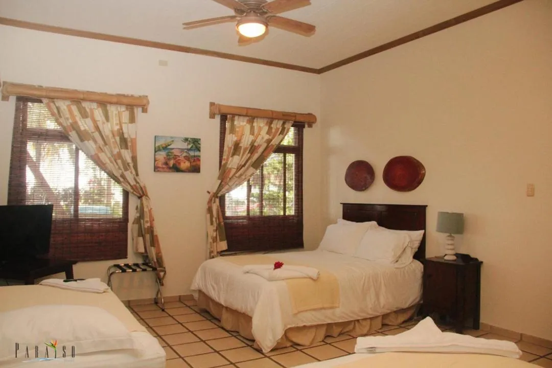 Bed in Paraiso Rainforest and Beach Hotel