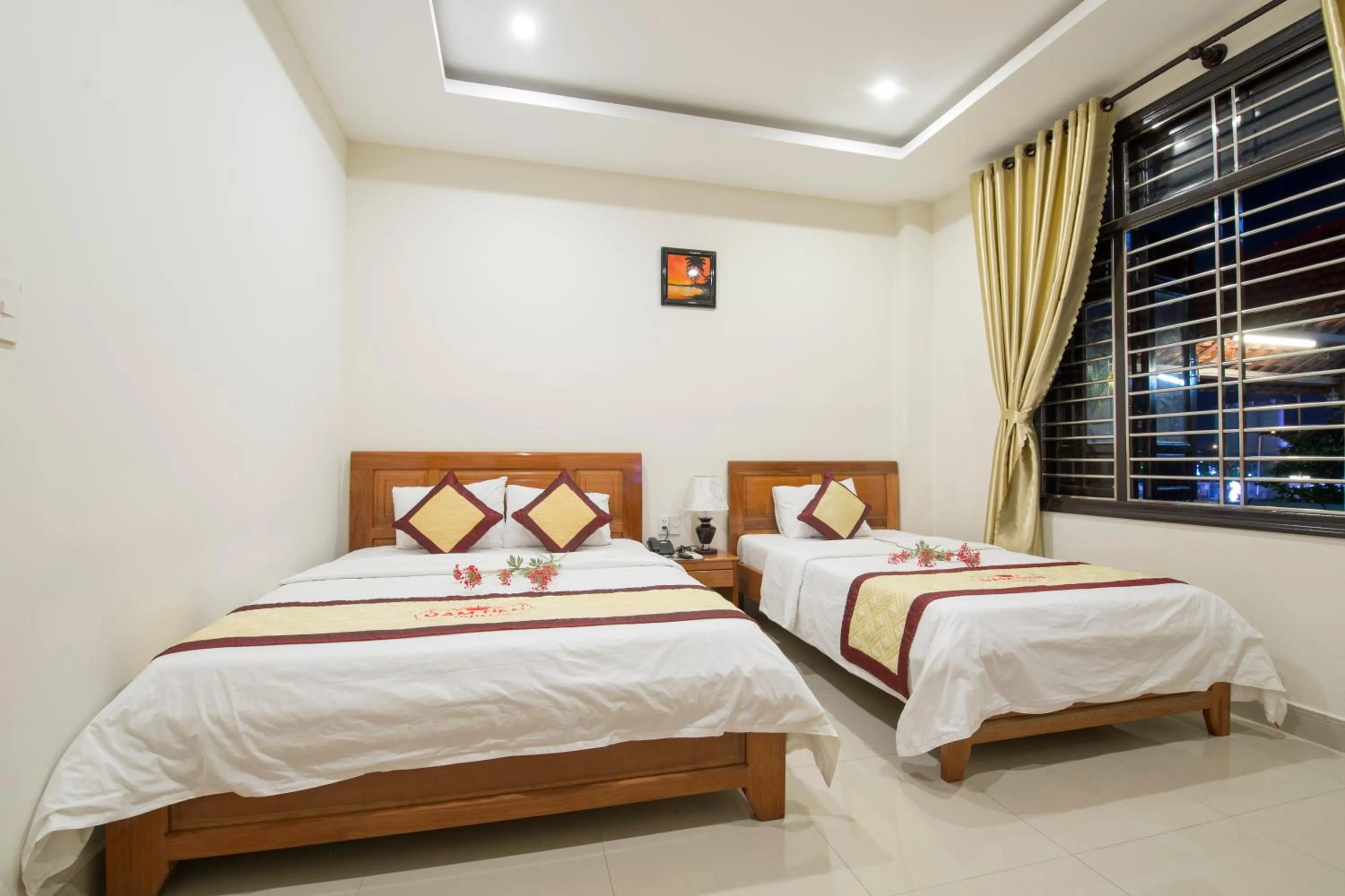 Photo of the whole room, Bed in Dam Tien Hotel