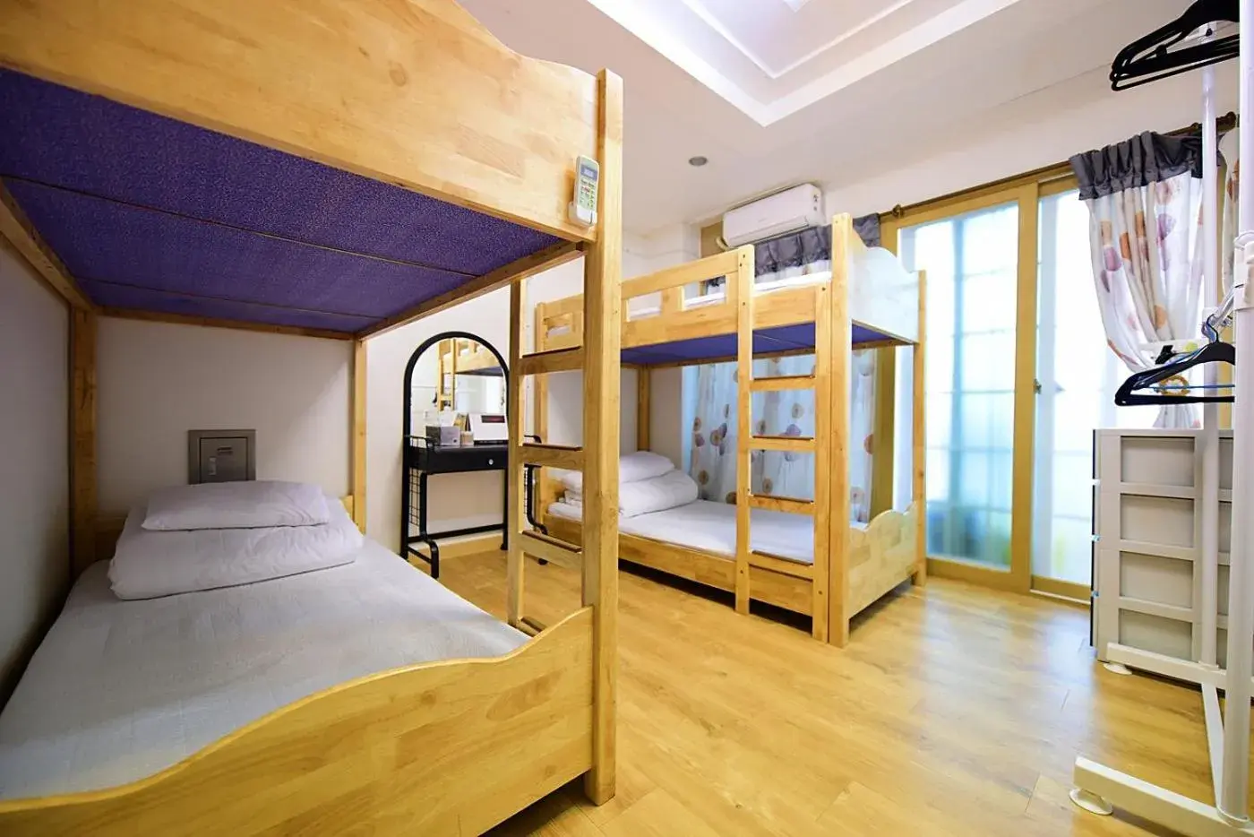 Bed in 4-Bed Female Dormitory Room in Ganderak Guesthouse Bed in 4-Bed Female Dormitory Room in Ganderak Guesthouse