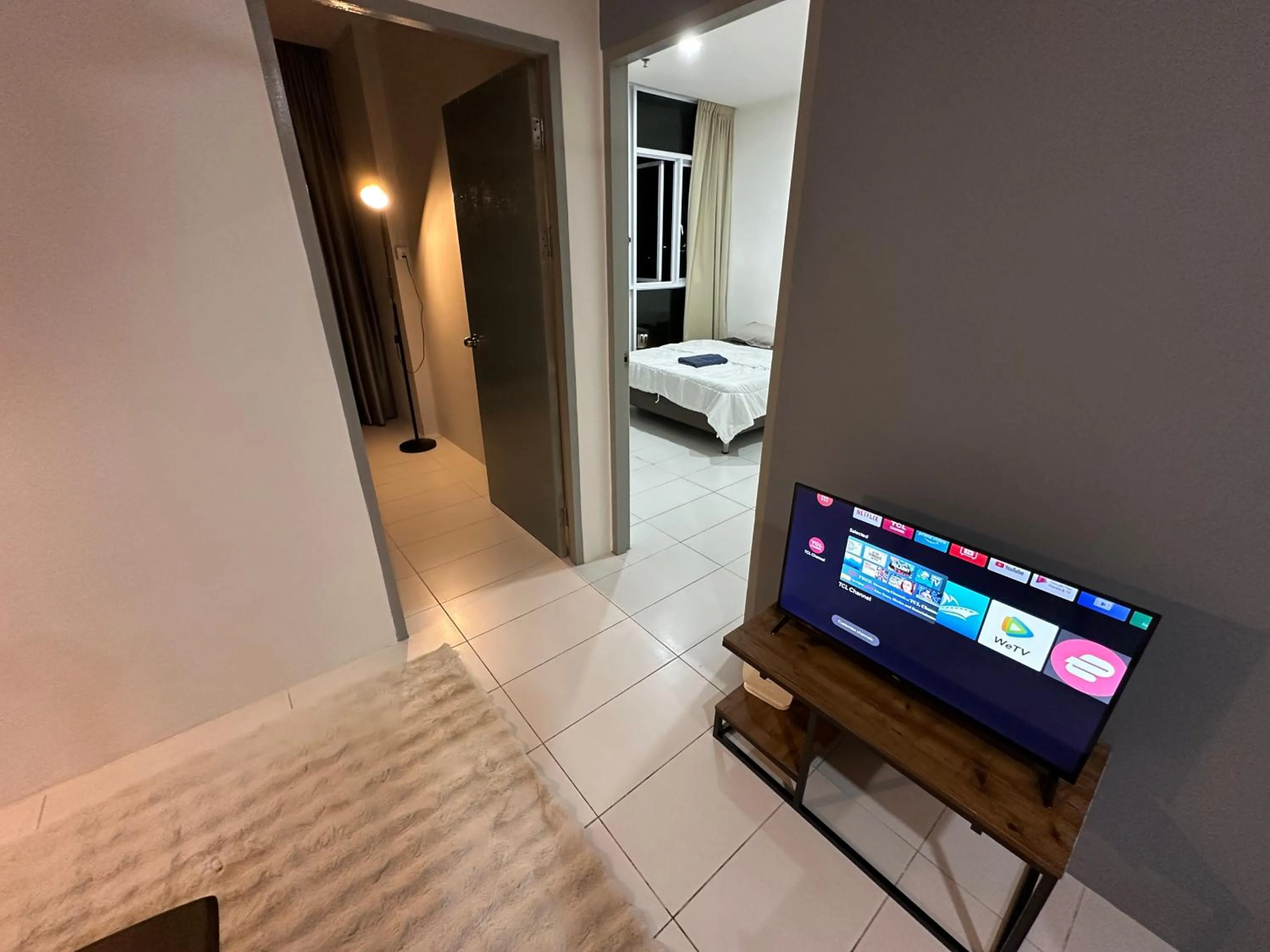 Communal lounge/ TV room, Bed in TT3 SOHO near Viva Kuching