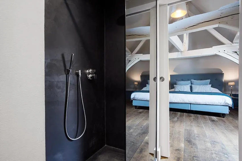 Bathroom, Bed in Ganda Rooms & Suites