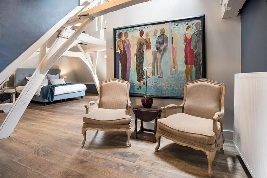 Seating area in Ganda Rooms & Suites