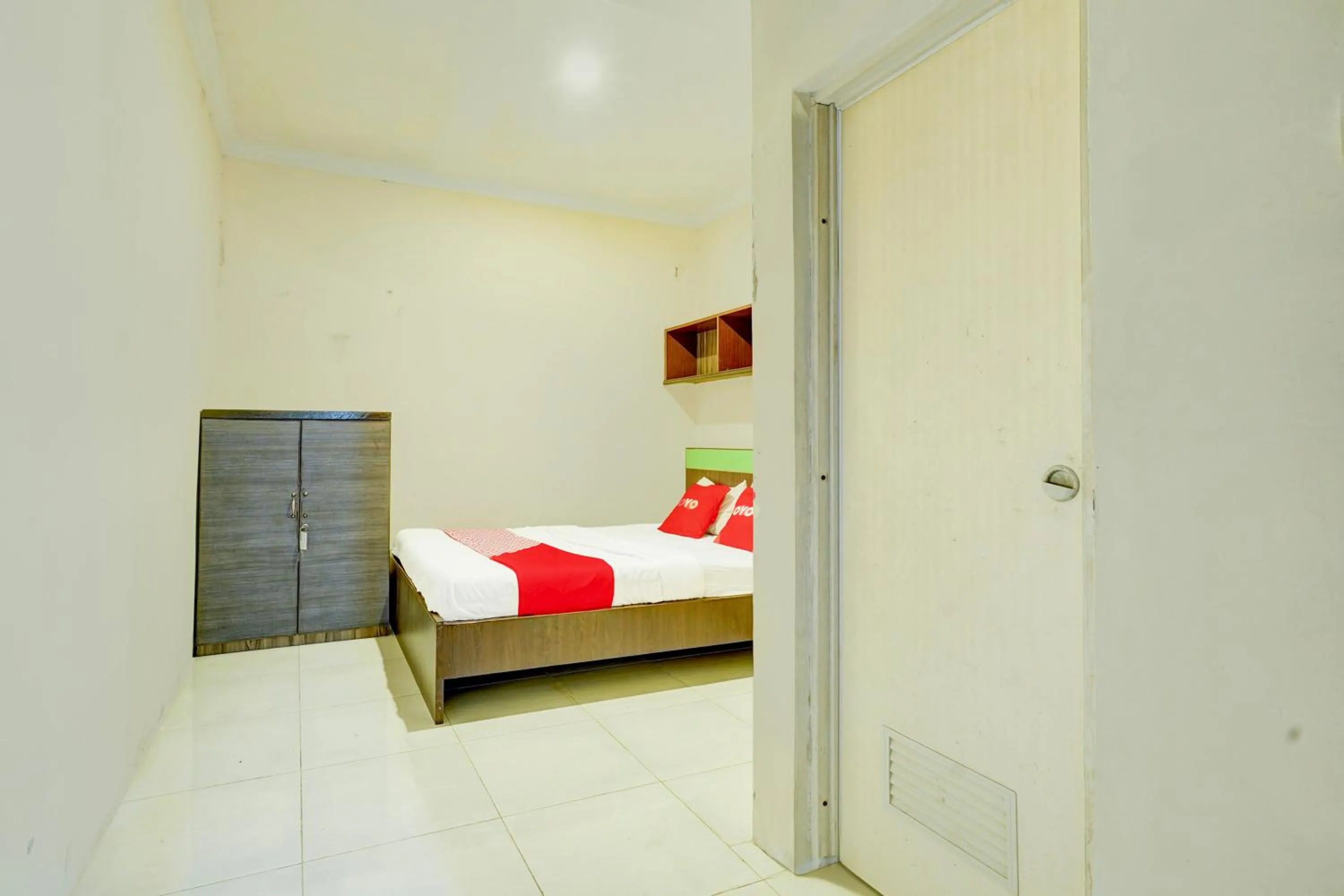 Photo of the whole room, Bed in Hotel O Slawi Near Alun- Alu Slawi Formerly Boarding Inn