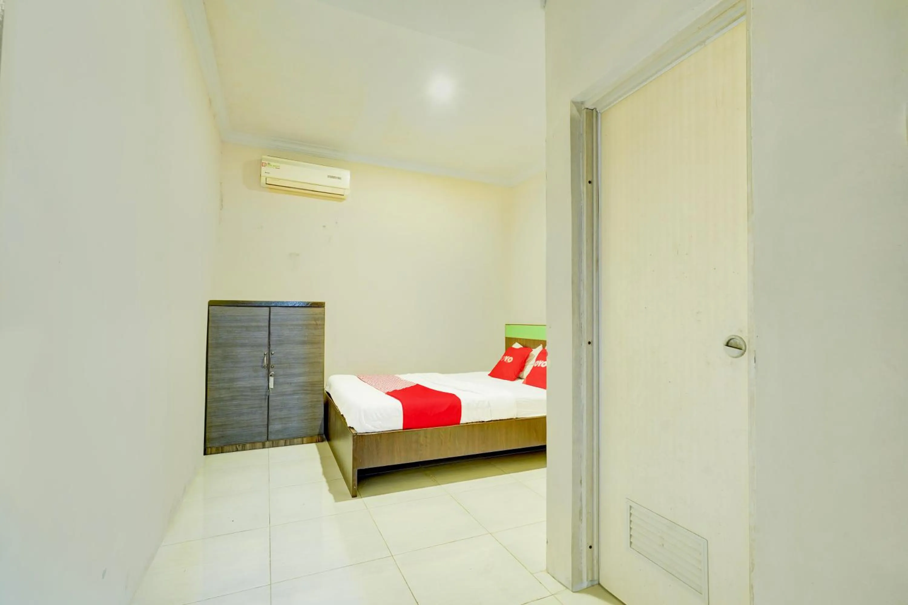 Photo of the whole room, Bed in Hotel O Slawi Near Alun- Alu Slawi Formerly Boarding Inn