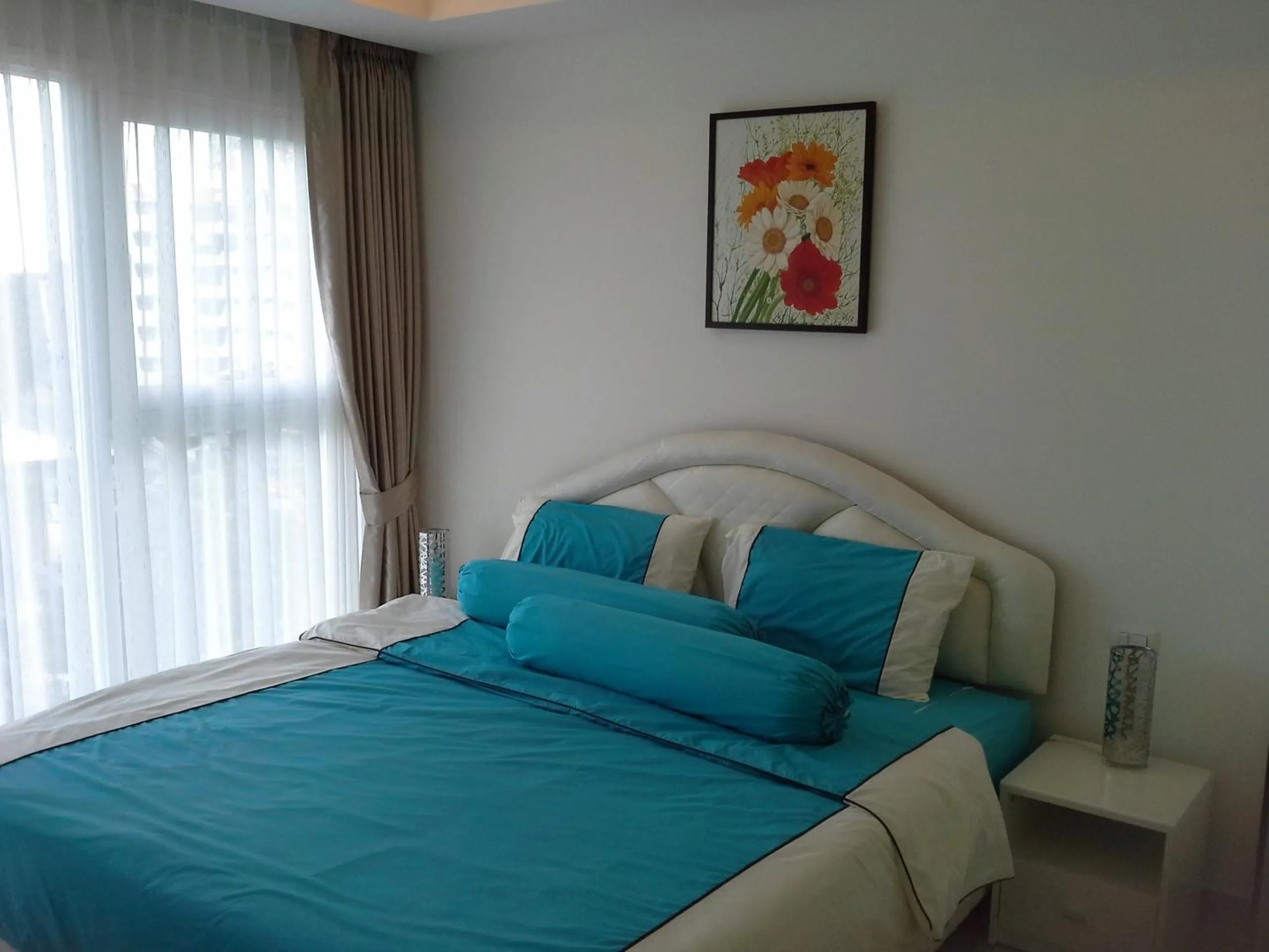 Bed in Cosy Beach View Apartments