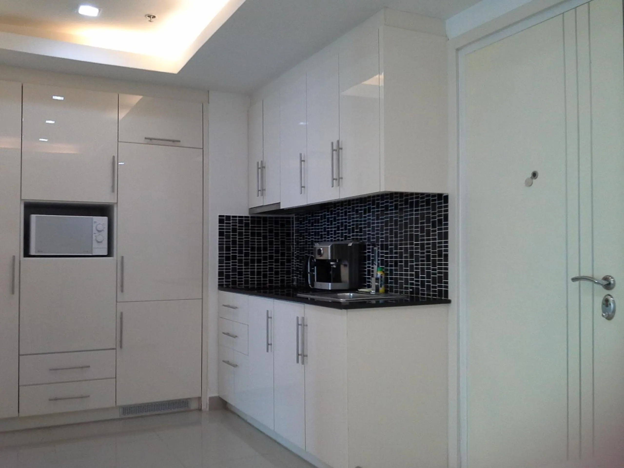Kitchen or kitchenette in Cosy Beach View Apartments