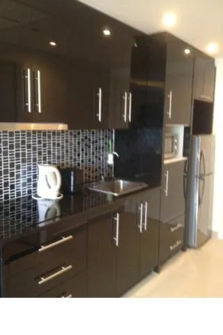 Kitchen or kitchenette in Cosy Beach View Apartments