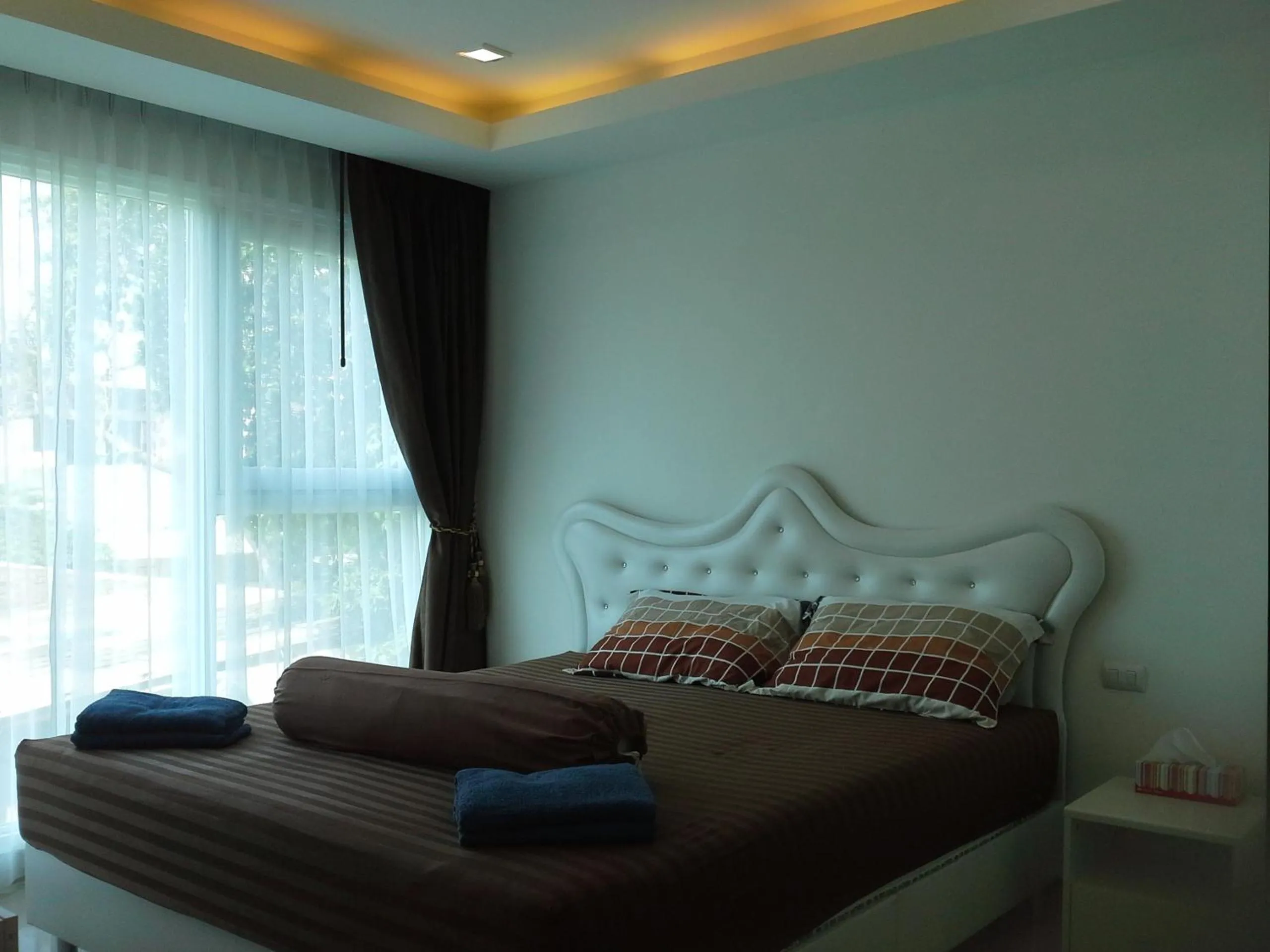 Bed in Cosy Beach View Apartments