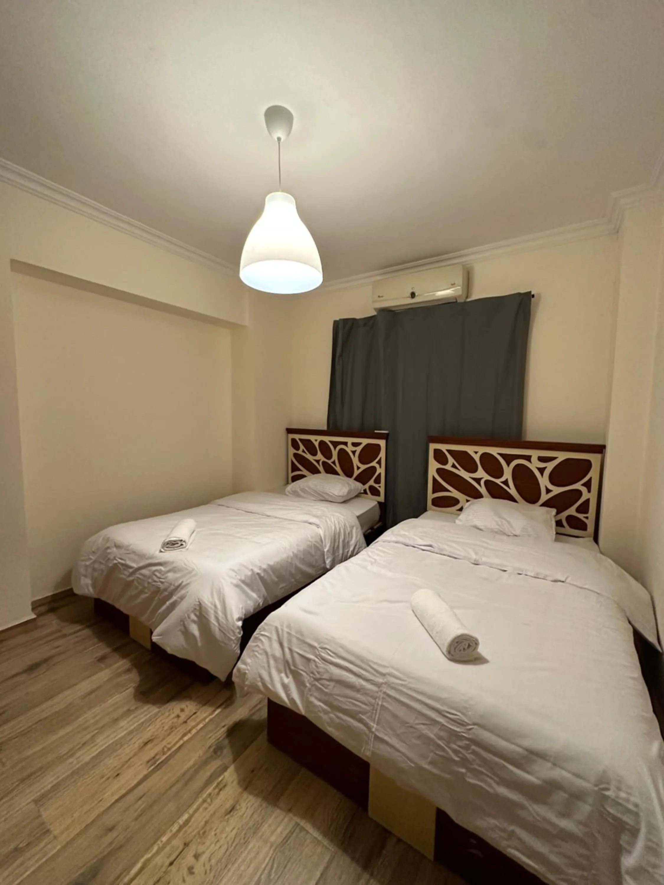 Bed in JRE-EG modern aprt Sheikh Zayed