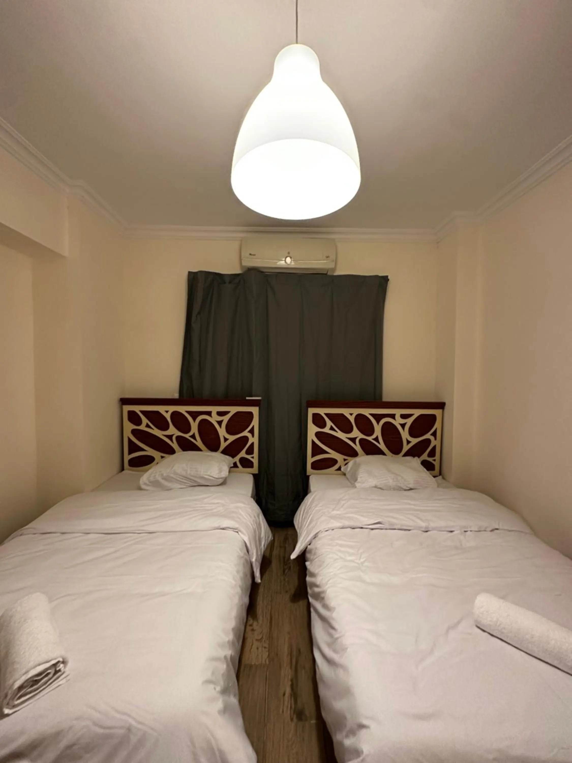 Bed in JRE-EG modern aprt Sheikh Zayed