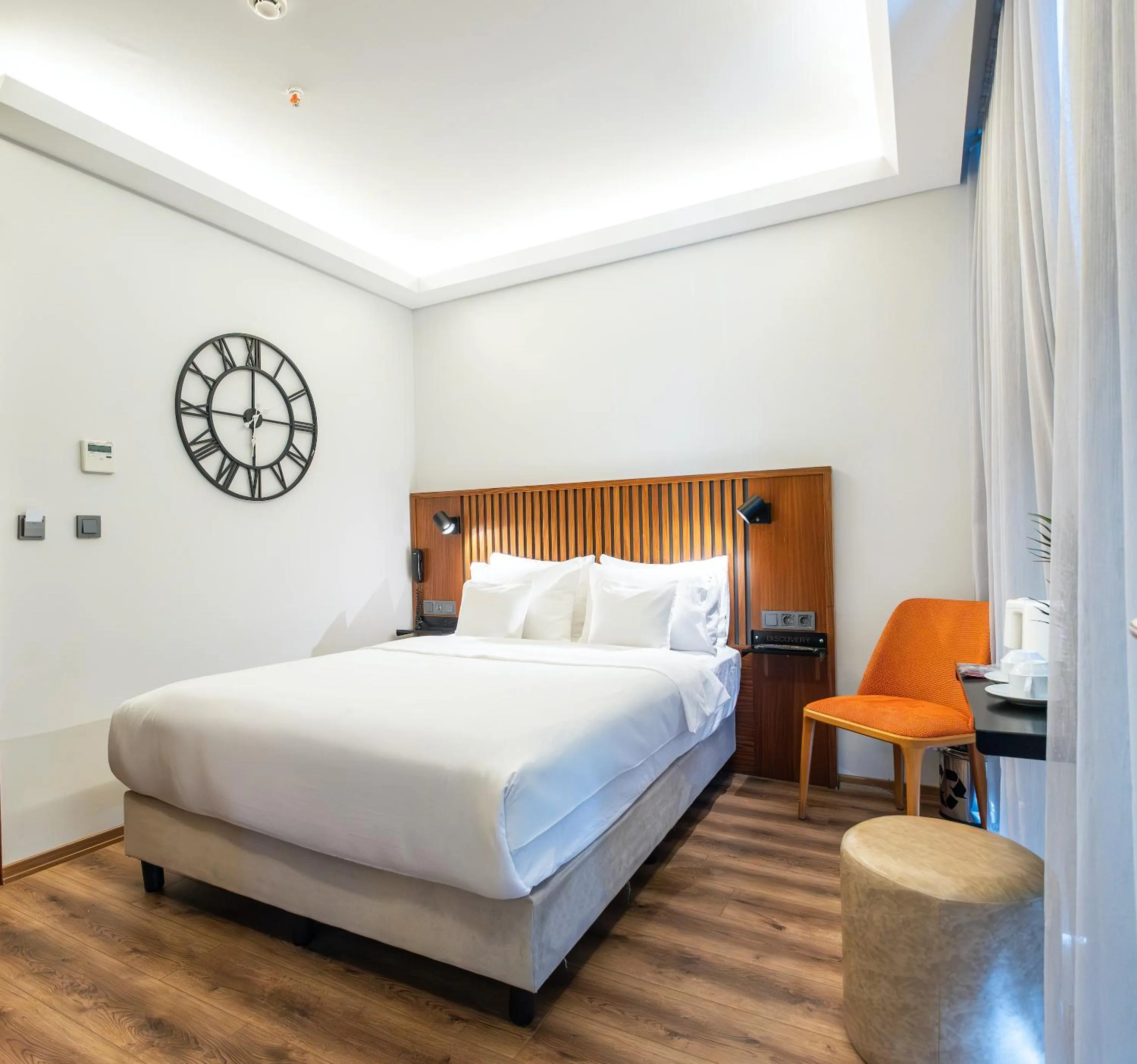 Bed in Discovery Hotel